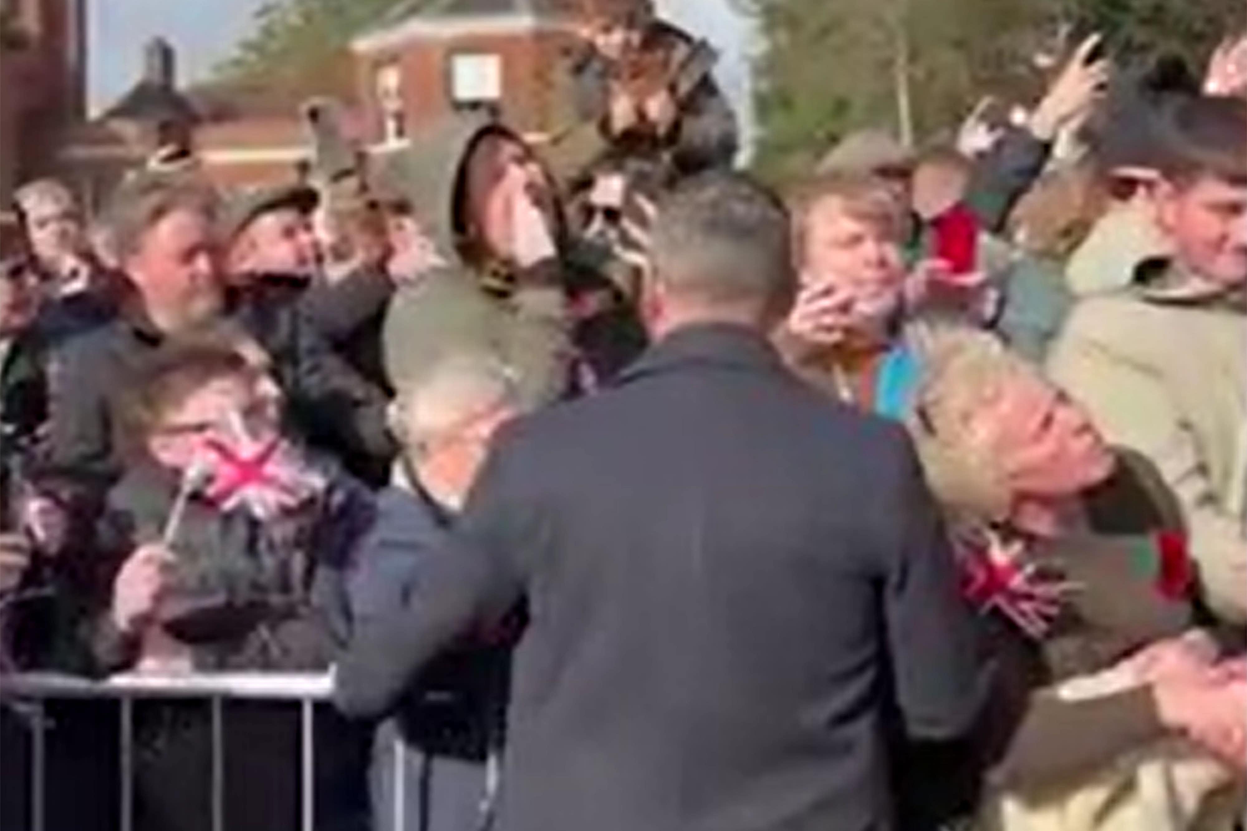 A still from a video of the man shouting during a visit to Lichfield Cathedral by the King (Stephanie Wareham/PA)