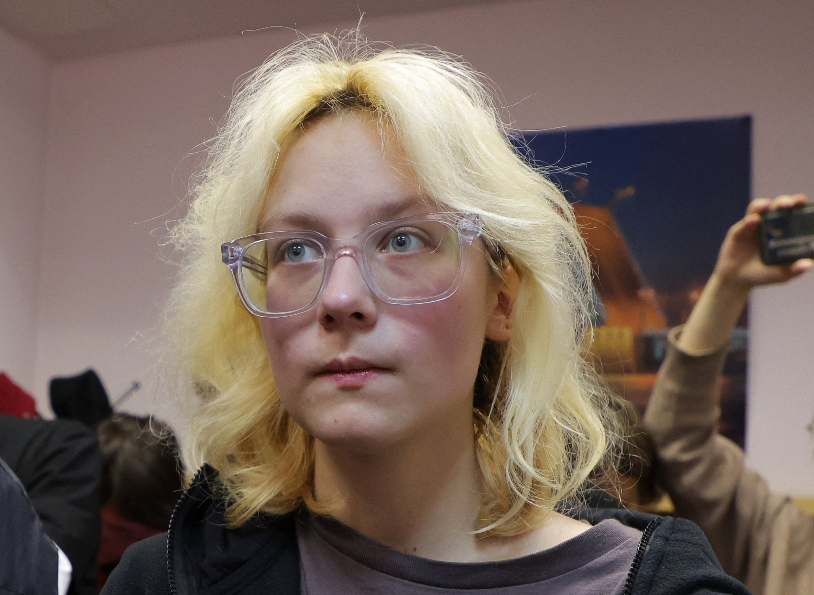 Diana Loginova, an 18-year-old street musician performing under the name Naoko, charged with discrediting Russia's armed forces, attends a court hearing in Saint Petersburg, Russia