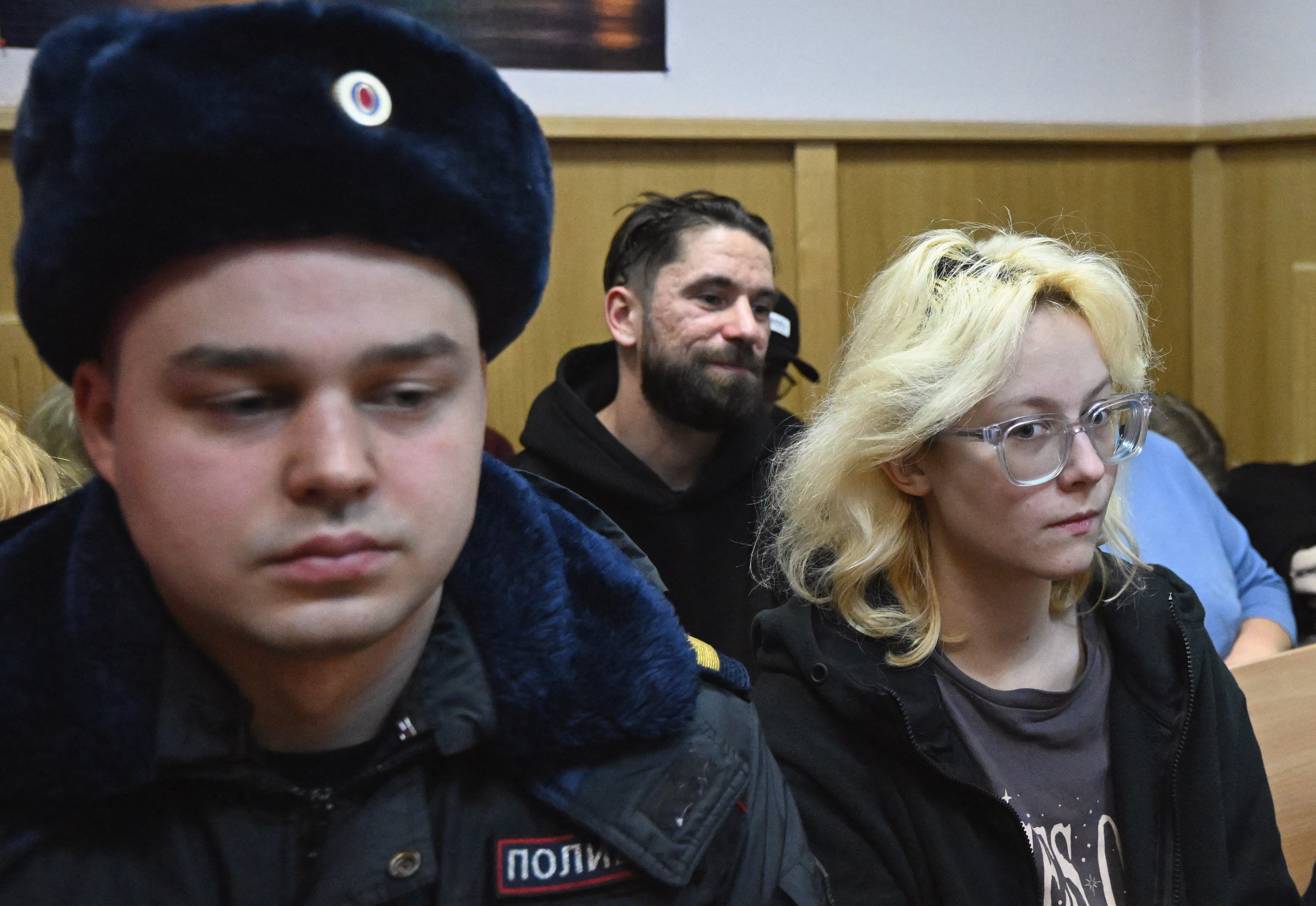 Lead singer of pop band Stoptime Diana Loginova (R), who was detained after publicly singing songs by bands known for their opposition to the Russian military campaign in Ukraine, attends court hearings in Saint Petersburg.