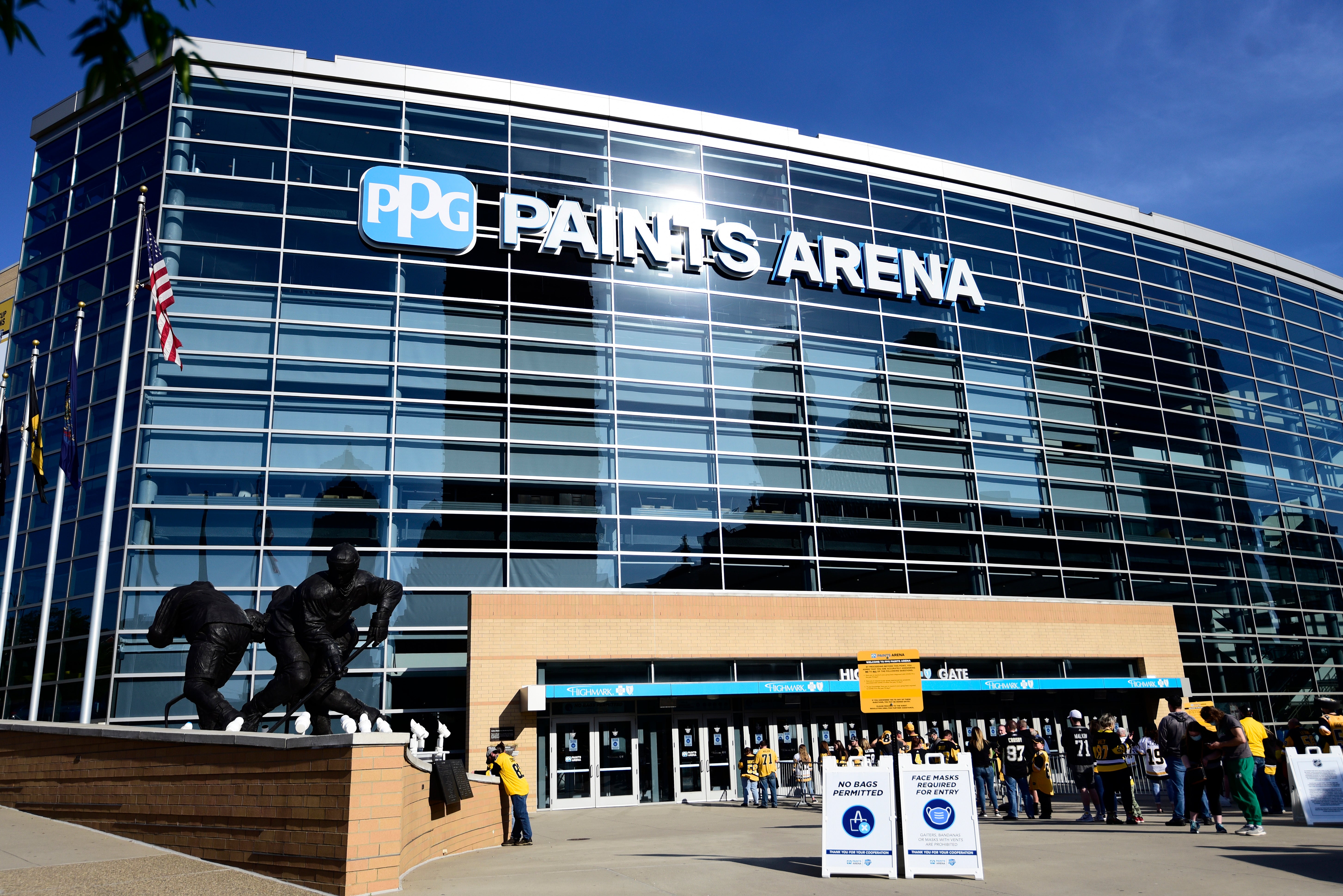 A man fell from the 200-level concourse to the lower level Monday at PPG Paints Arena, hitting another fan along the way