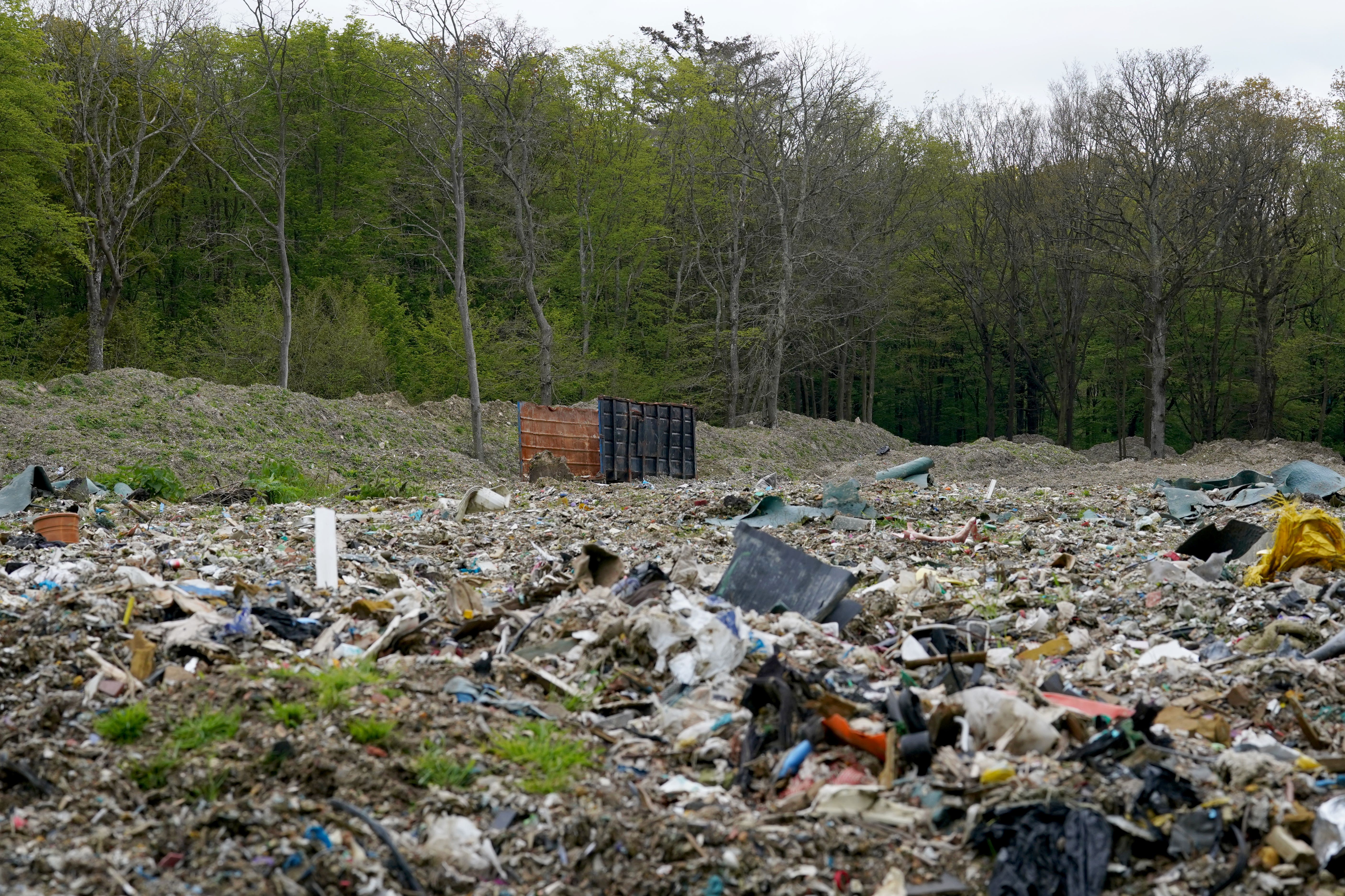 A view of thousands of tonnes of illegal waste dumped within Hoads Wood in Ashford, Kent (Gareth Fuller/PA)