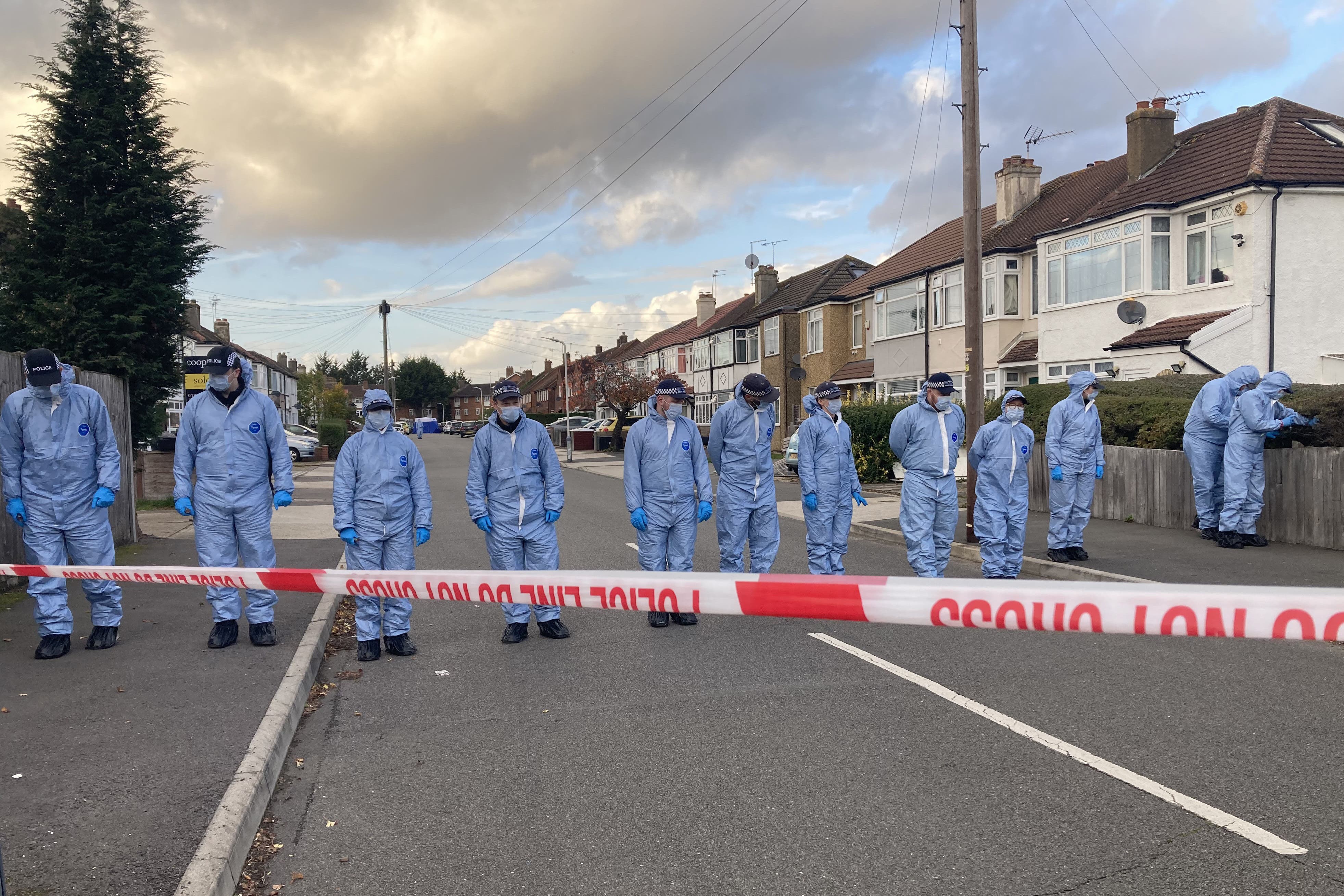Forensic officers at the scene in Midhurst Gardens in Uxbridge (Jordan Reynolds/PA)
