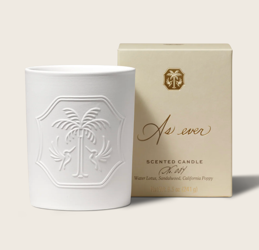 The holiday collection includes scented candles for $64 each