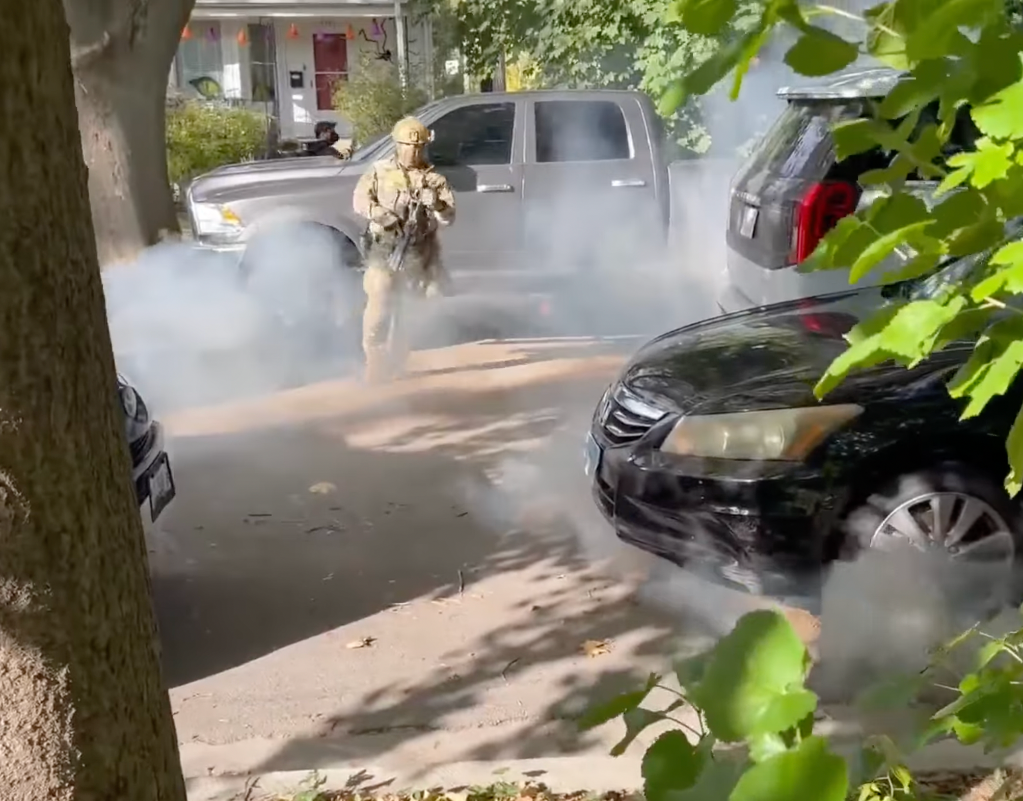 Agents unleashed tear gas as they left the area