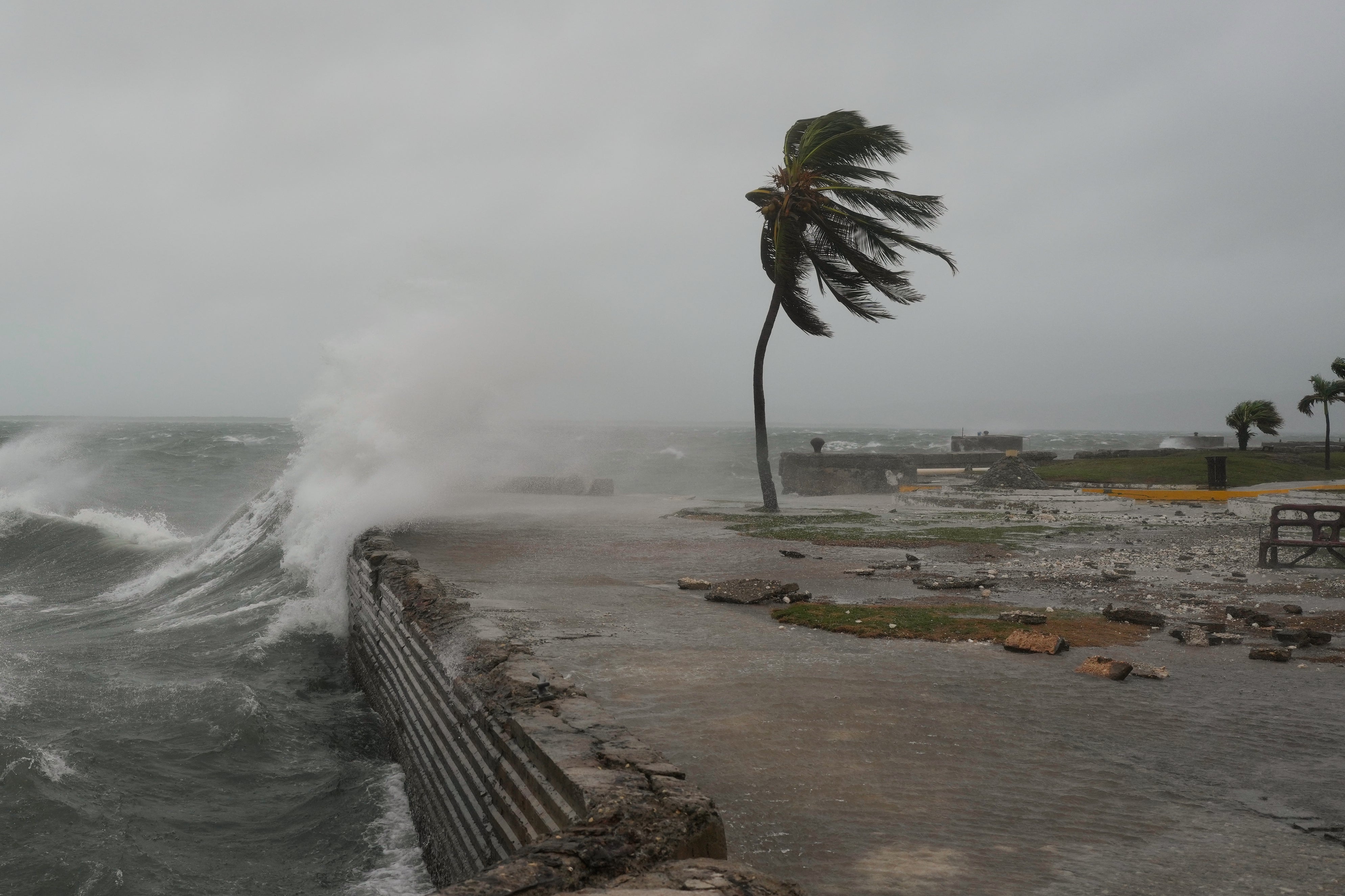 Waves whipped up in Kingston, Jamaica, as Hurricane Melissa approaches. The storm shows the need to adapt to the climate crisis as extreme weather worsens