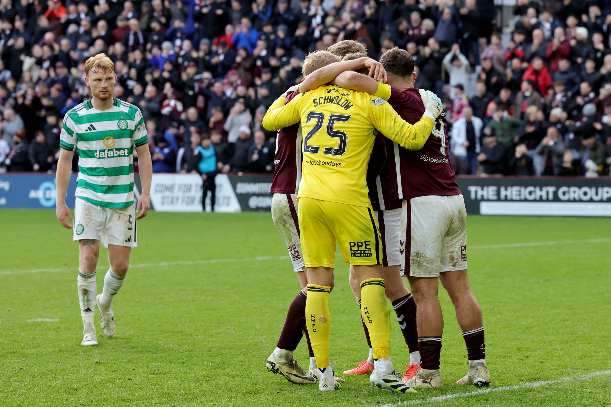 Hearts beat Celtic 3-1 on Sunday to move eight points clear