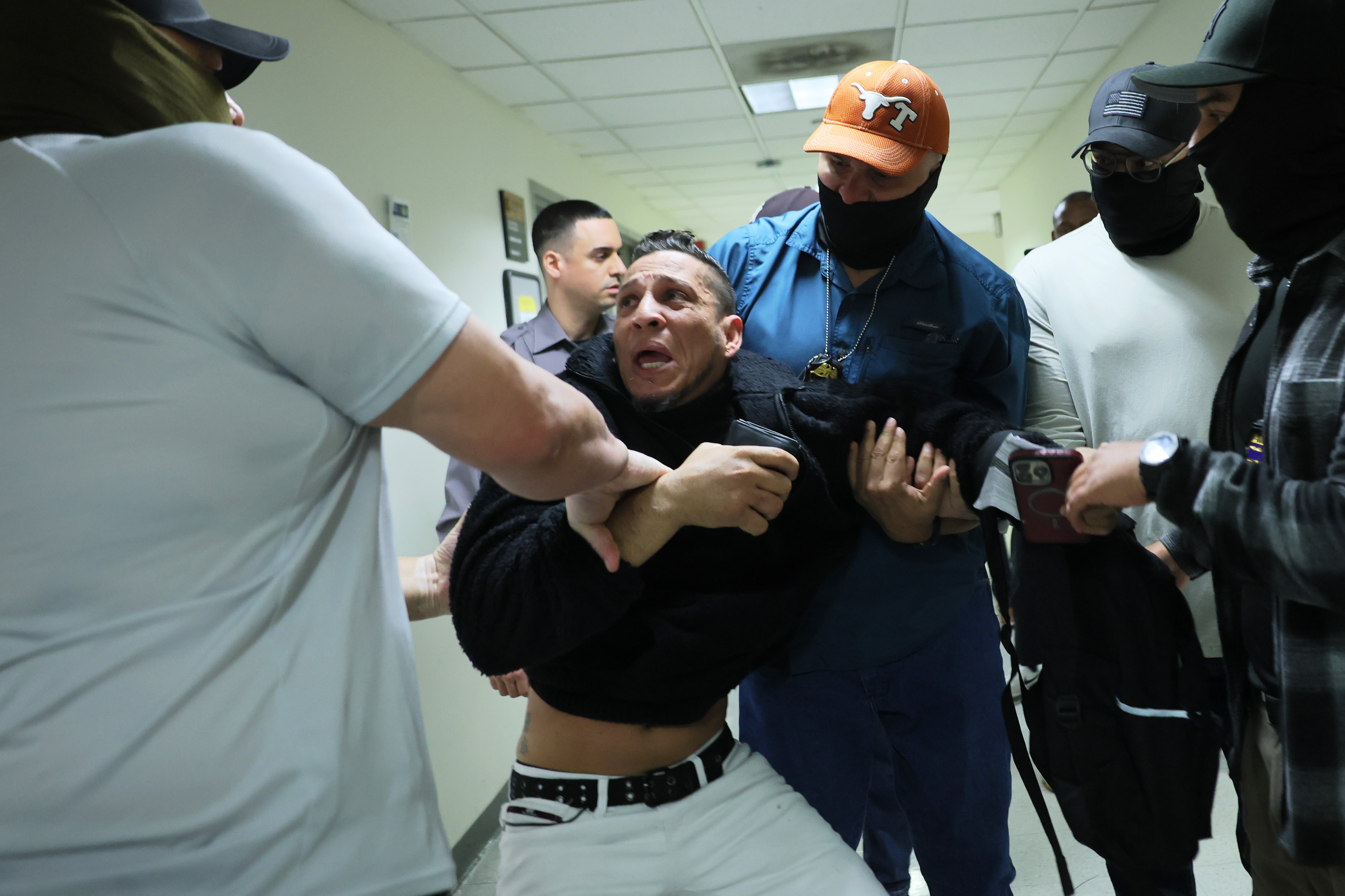 A man seeking asylum from Colombia is detained by federal agents as he attends his court hearing in immigration court at the Jacob K. Javitz Federal Building in New York City