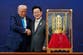 Trump who said he is not a king and denounced the No Kings protests is gifted a gold crown while in Korea