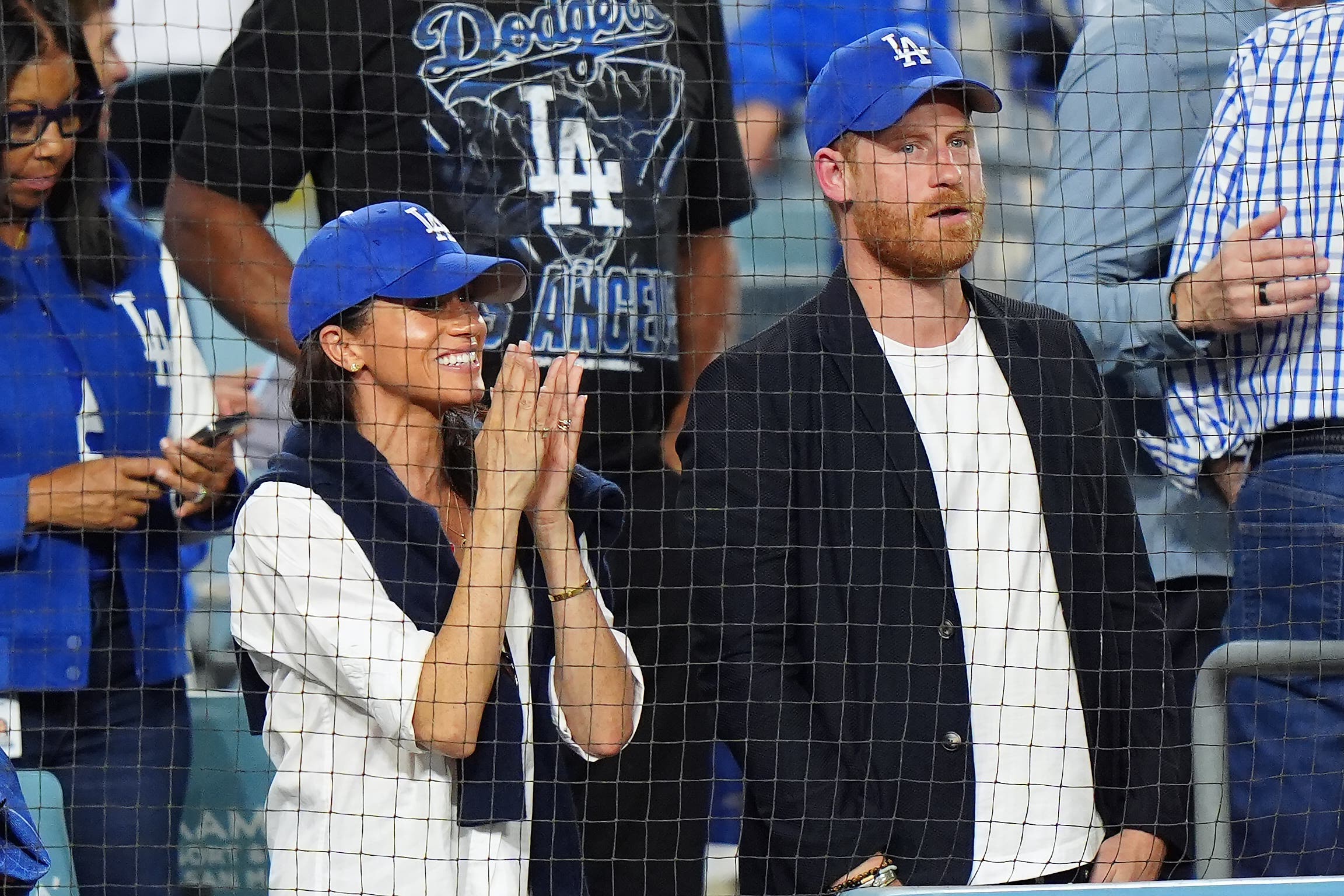Harry and Meghan watching the LA Dodgers and the Toronto Blue Jays (Frank Gunn/The Canadian Press via AP)