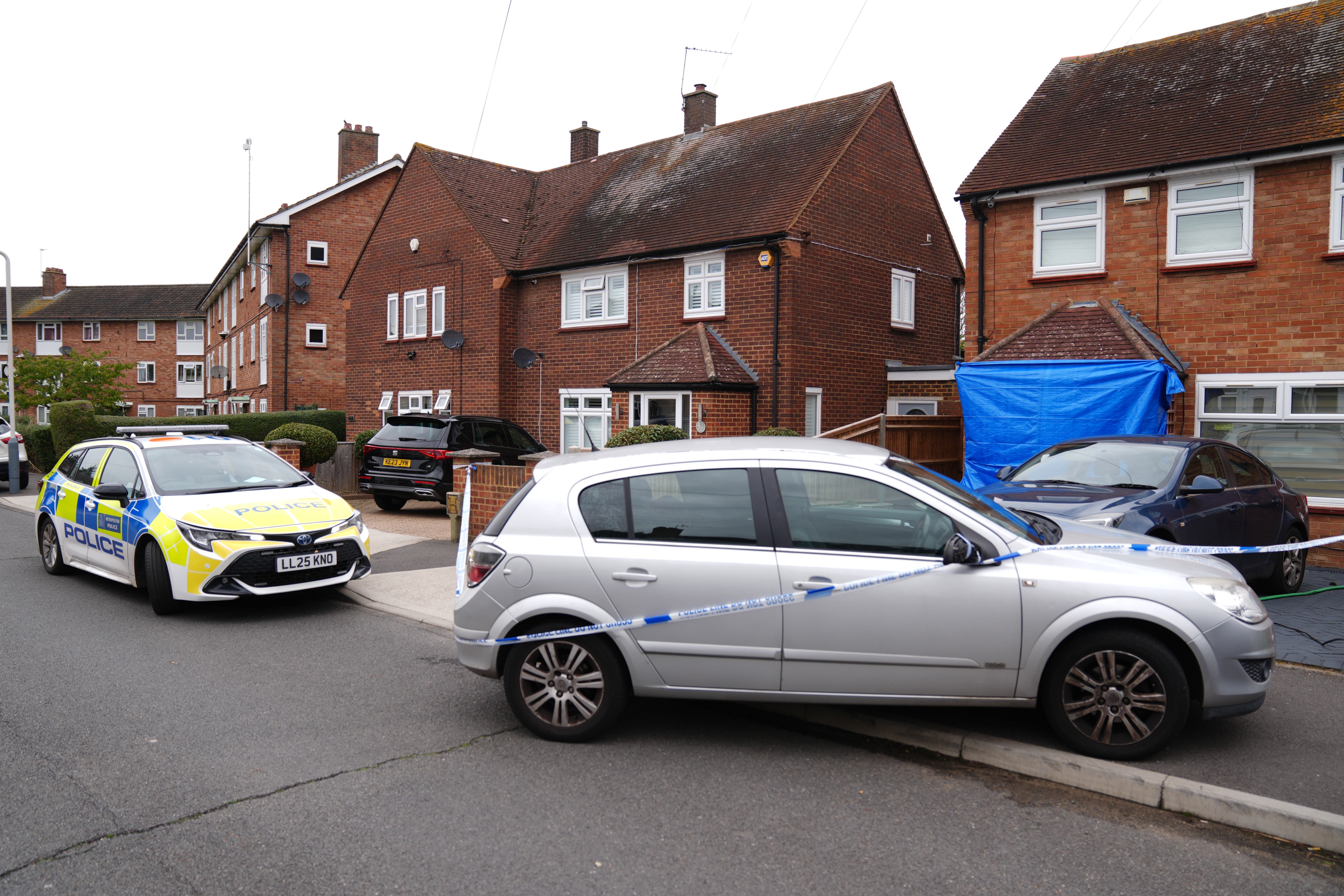 Residents in Midhurst Gardens are said to have rushed outside with baseball bats to defend an injured man