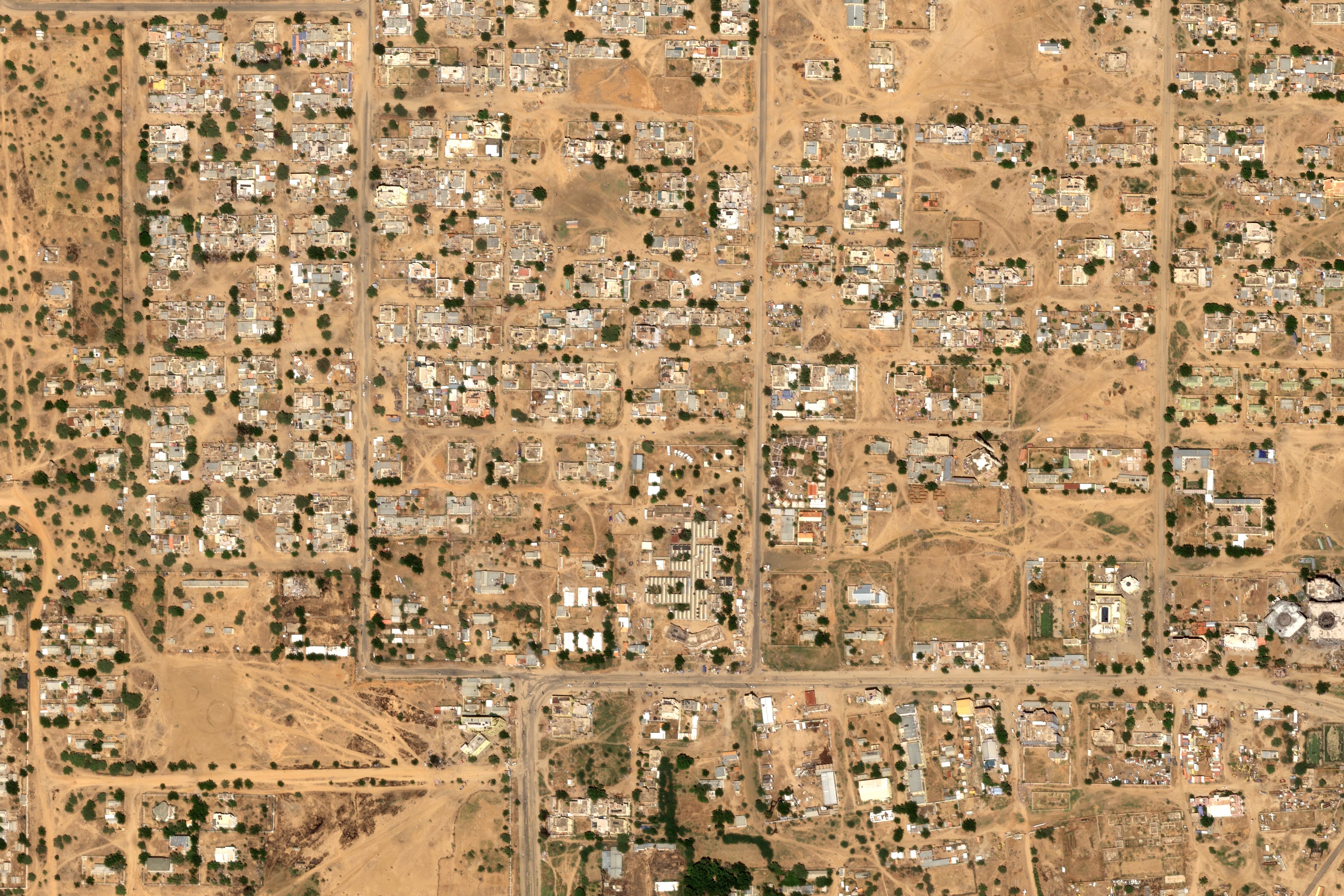 Pools of blood and bodies can be seen in satellite images