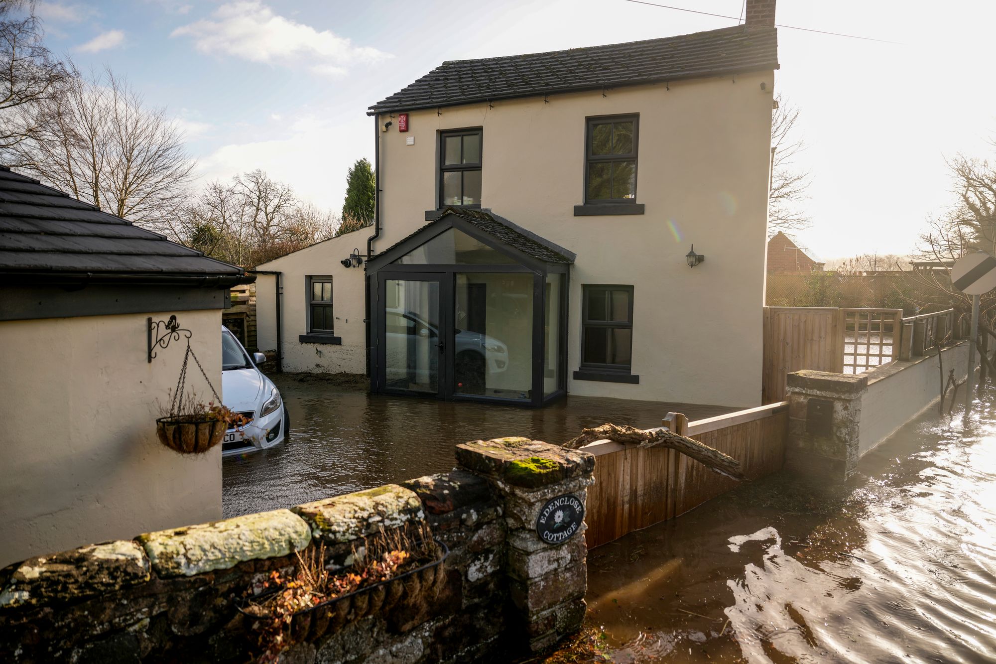 A home flooded after Rivre Eden burst from Storm Isha