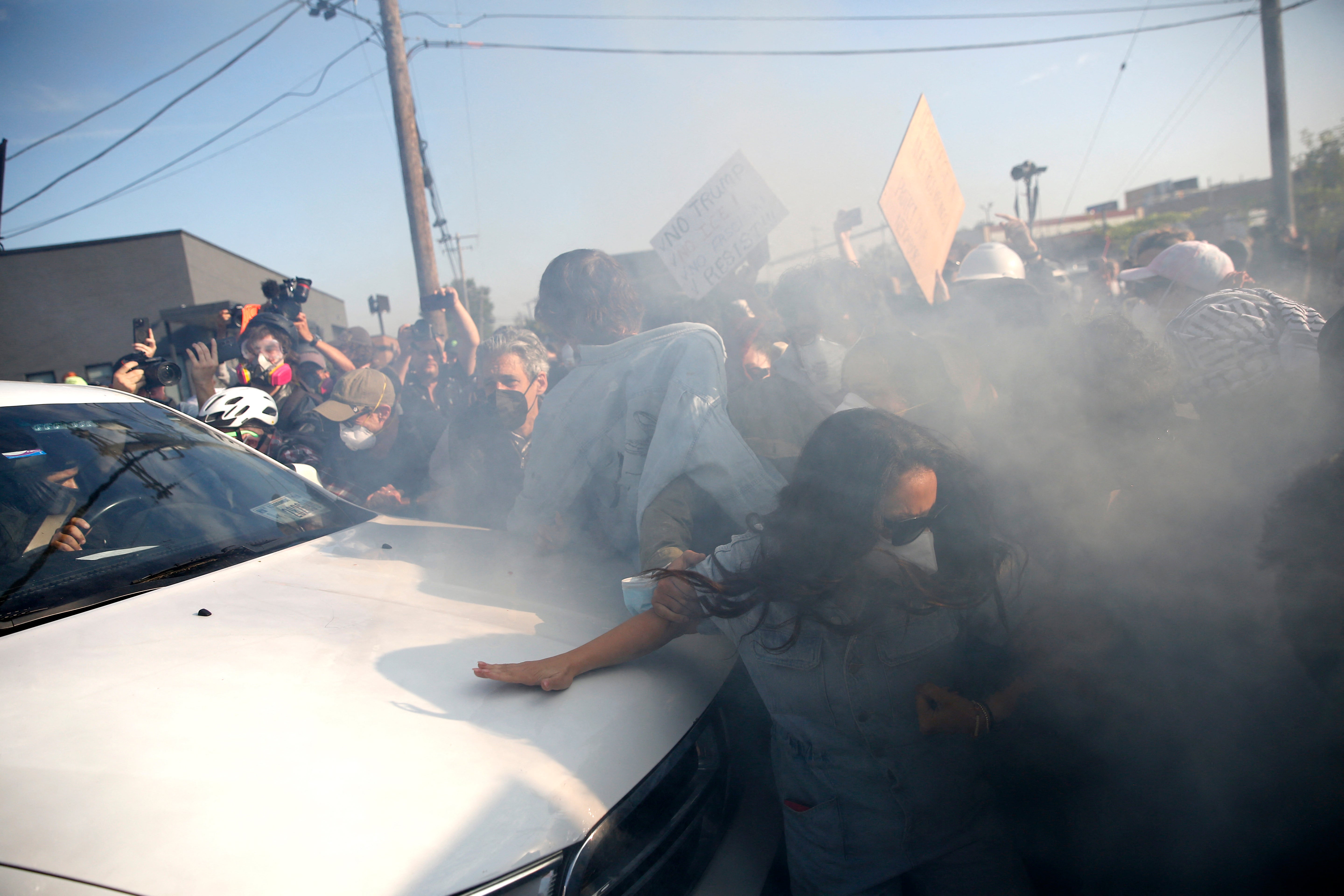 Protesters were charged with conspiracy and assault for allegedly blocking a federal officer from driving into a Chicago ICE facility that has been a flashpoint for demonstrations against the Trump administration’s mass deportation agenda