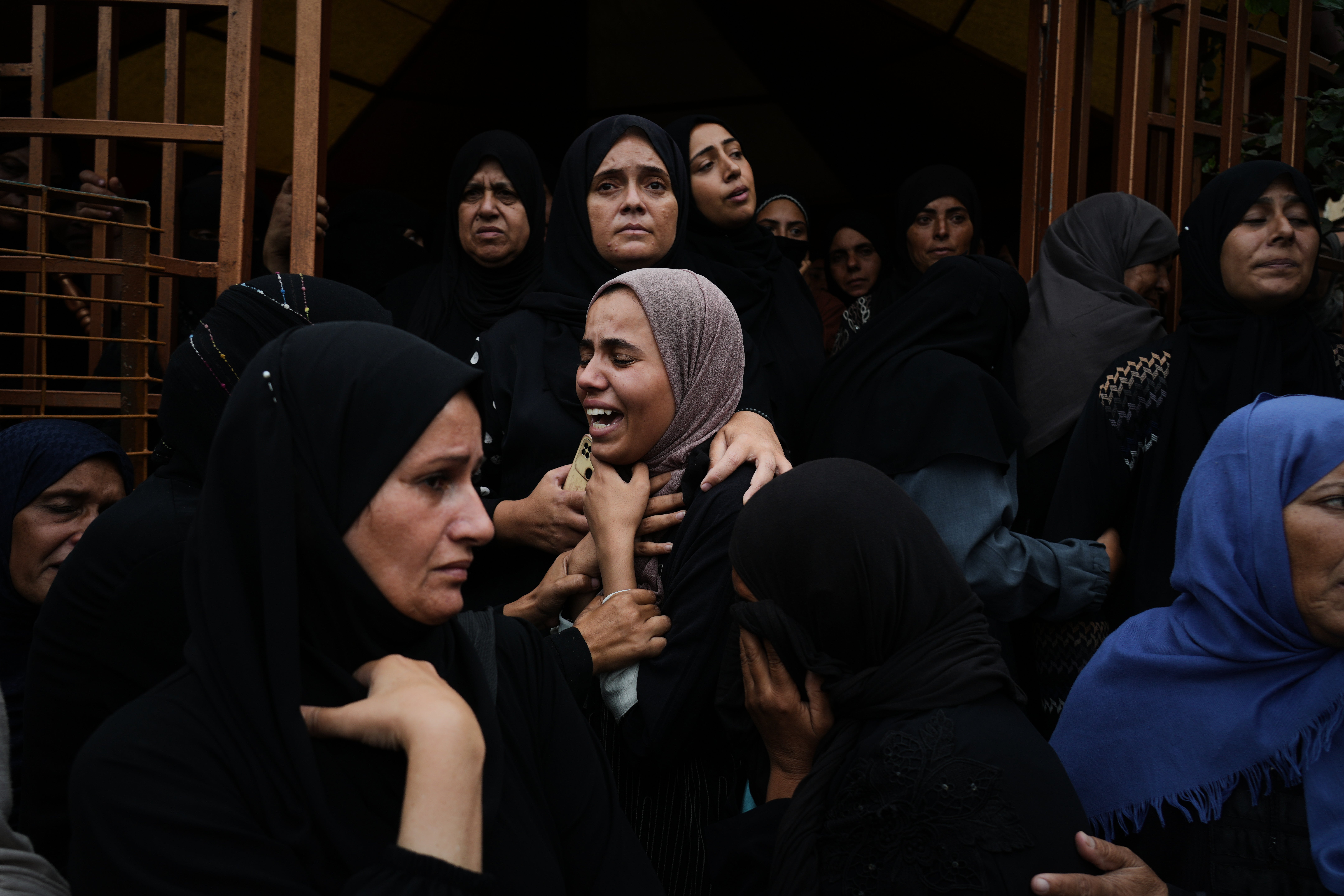 Mourners at the funeral of relatives killed in an Israeli army strike, at Nasser Hospital in Khan Younis on the Gaza Strip