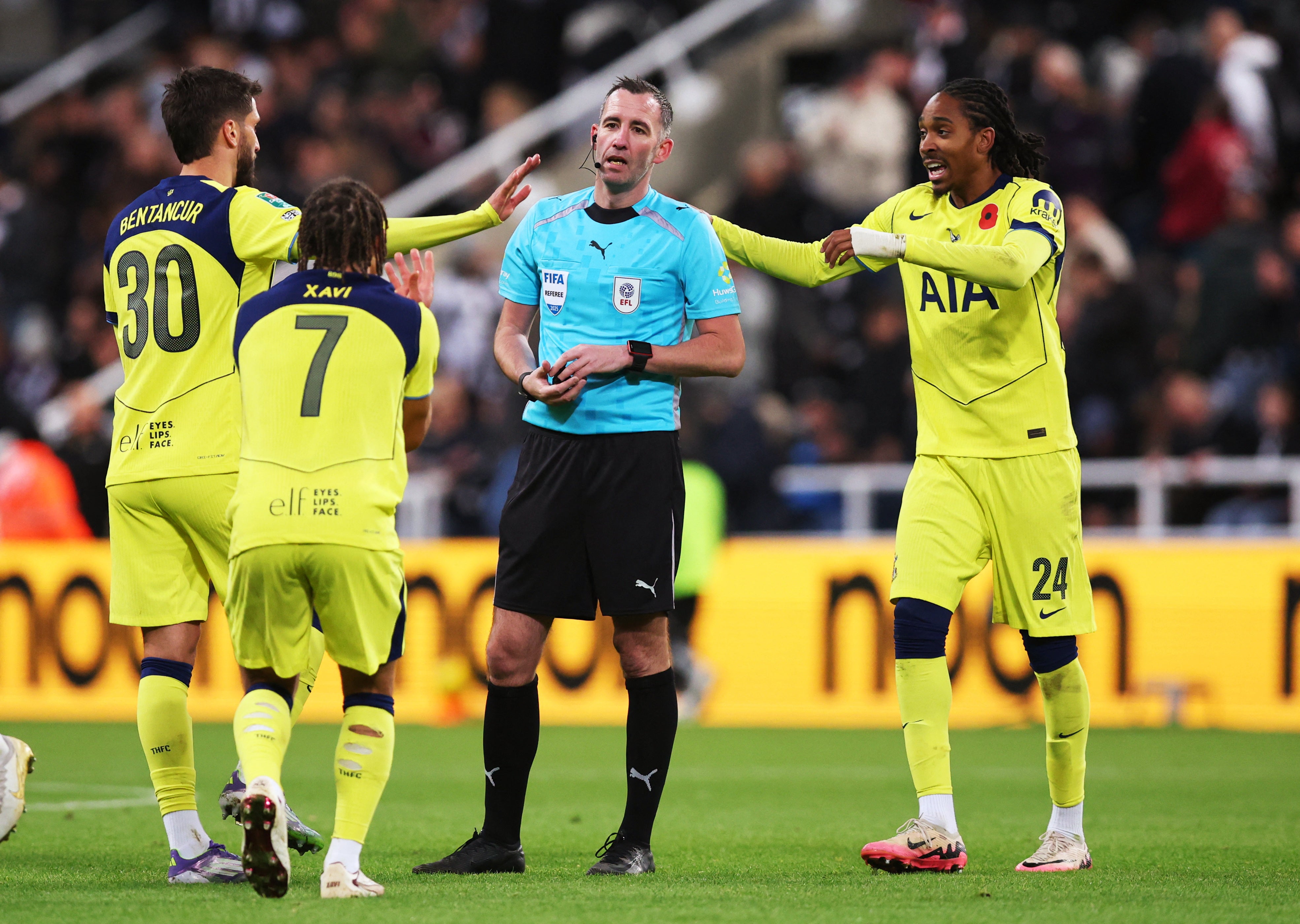 <p>Tottenham players fume with referee Chris Kavanagh</p>