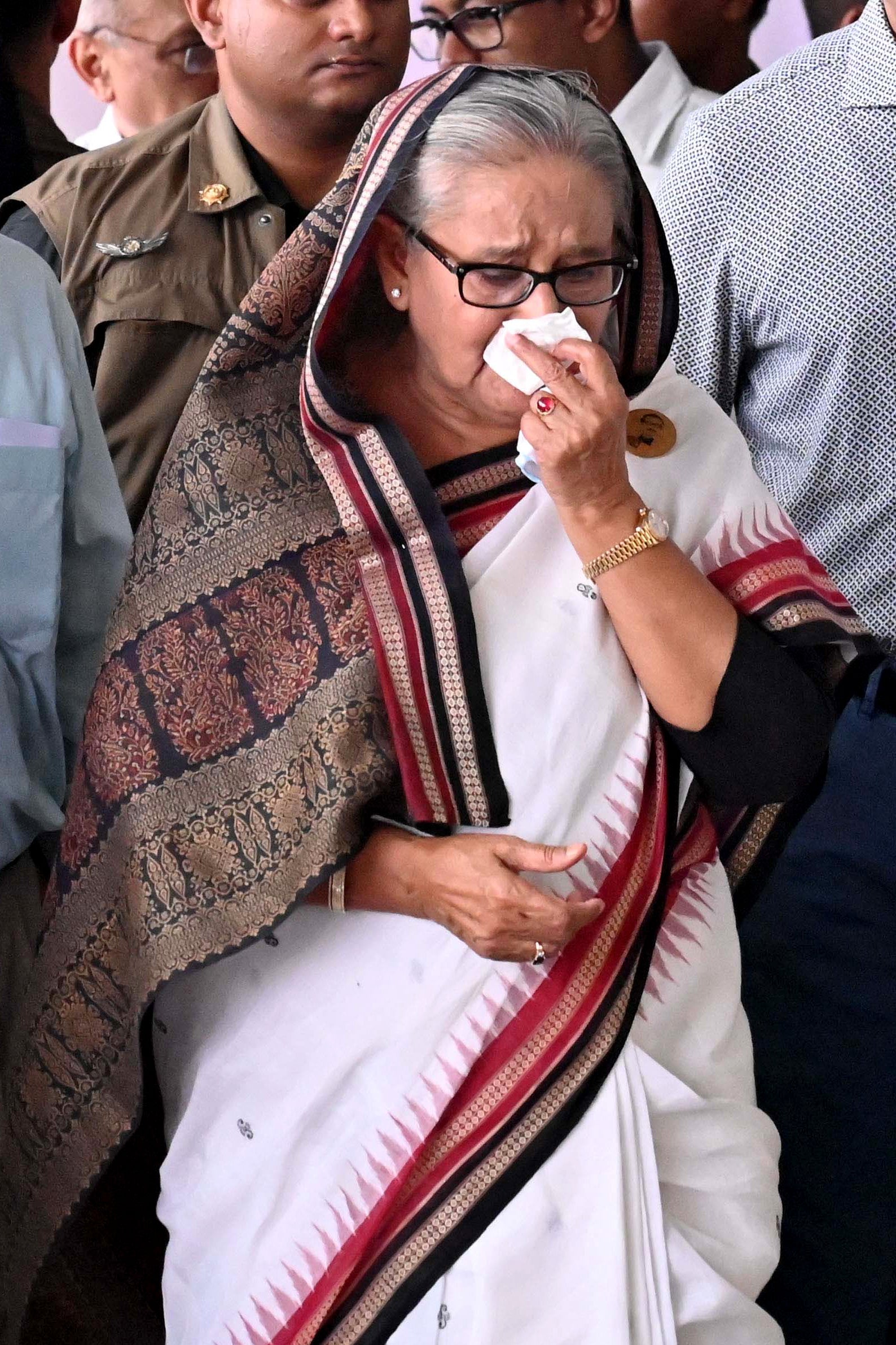 Sheikh Hasina weeps while she visits a metro station in Mirpur vandalised by students during the anti-quota protests