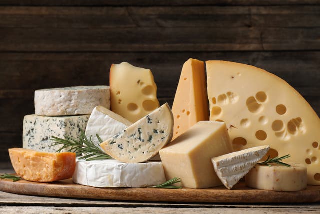 <p>Eating high-fat cheese has been linked to a lower risk of dementia (stock image) </p>