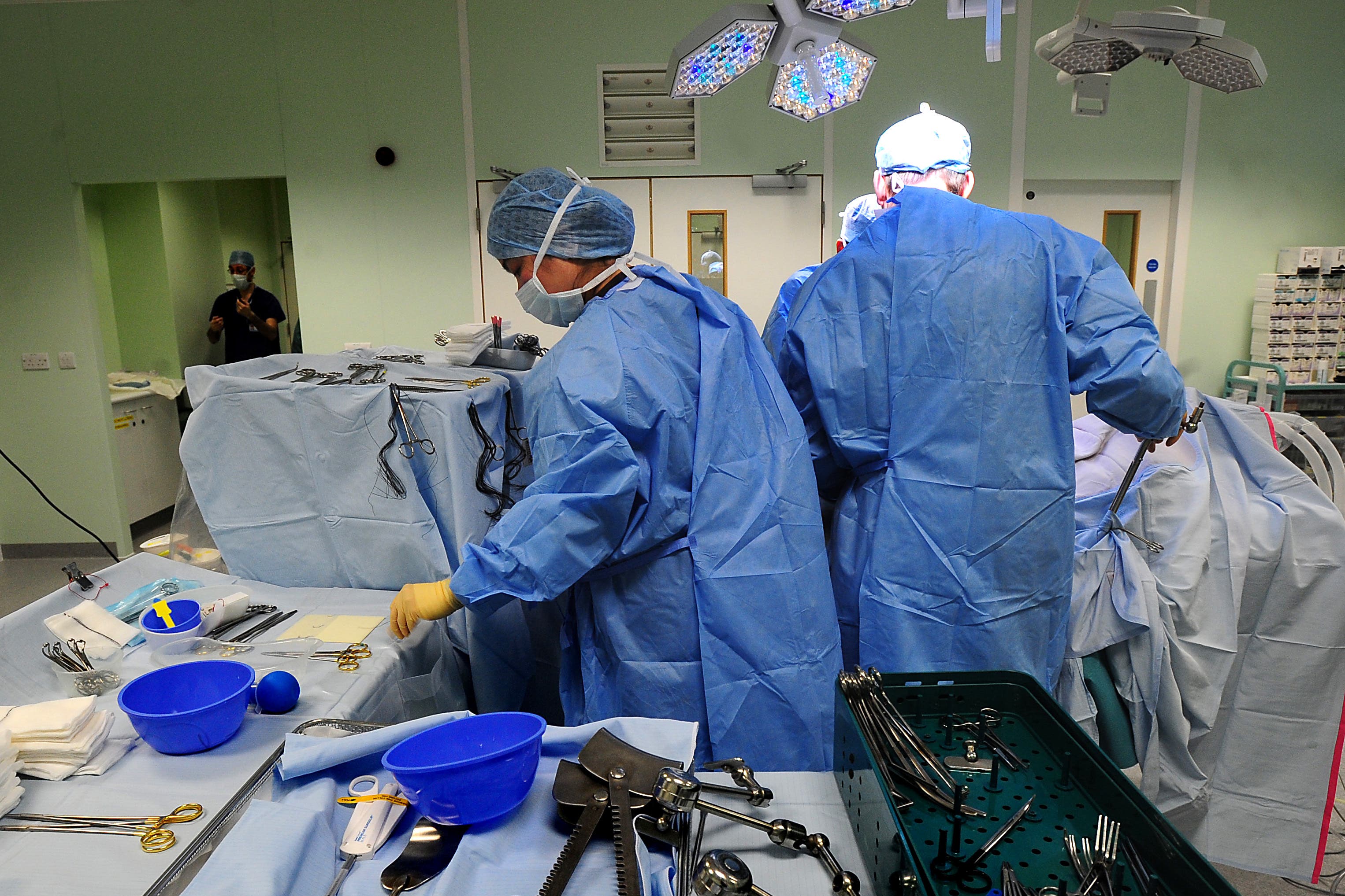 A shortage of anaesthetists is leading to delays in surgery, according to a review (PA)