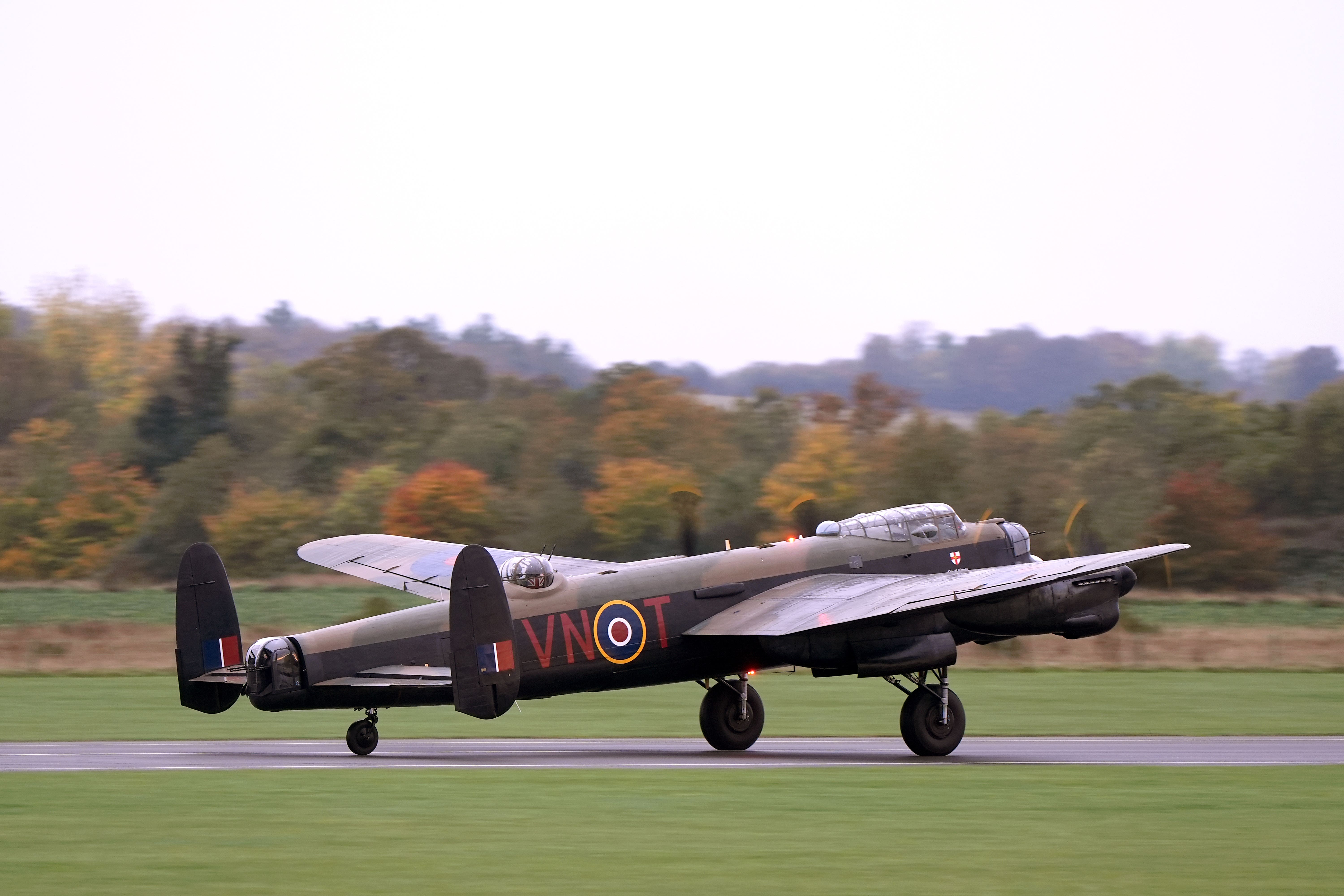 The Battle of Britain Memorial Flight’s Avro Lancaster PA474 touches down at IWM Duxford in Cambridgeshire (Joe Giddens/PA/PA)