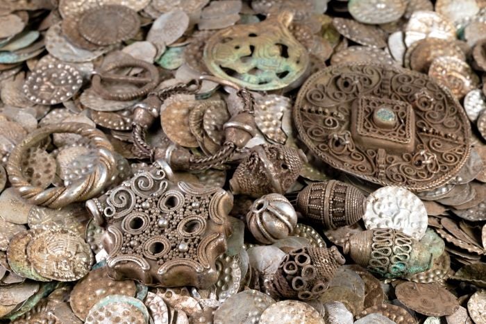 <p>An angler in Sweden has uncovered a remarkable haul of coins and jewellery from the Middle Ages</p>