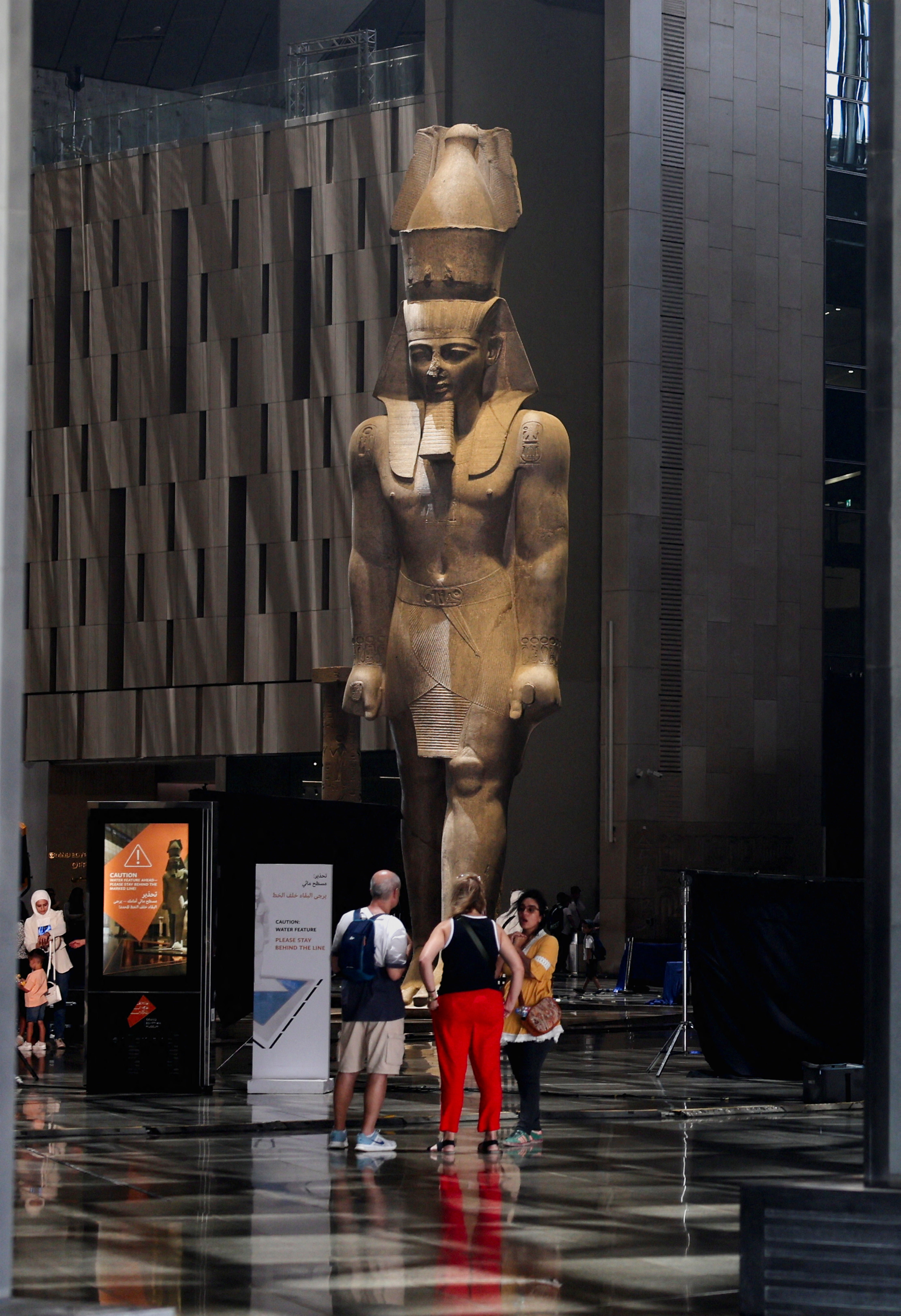 The imposing statue of King Ramesses II at the entrance of the Grand Egyptian Museum