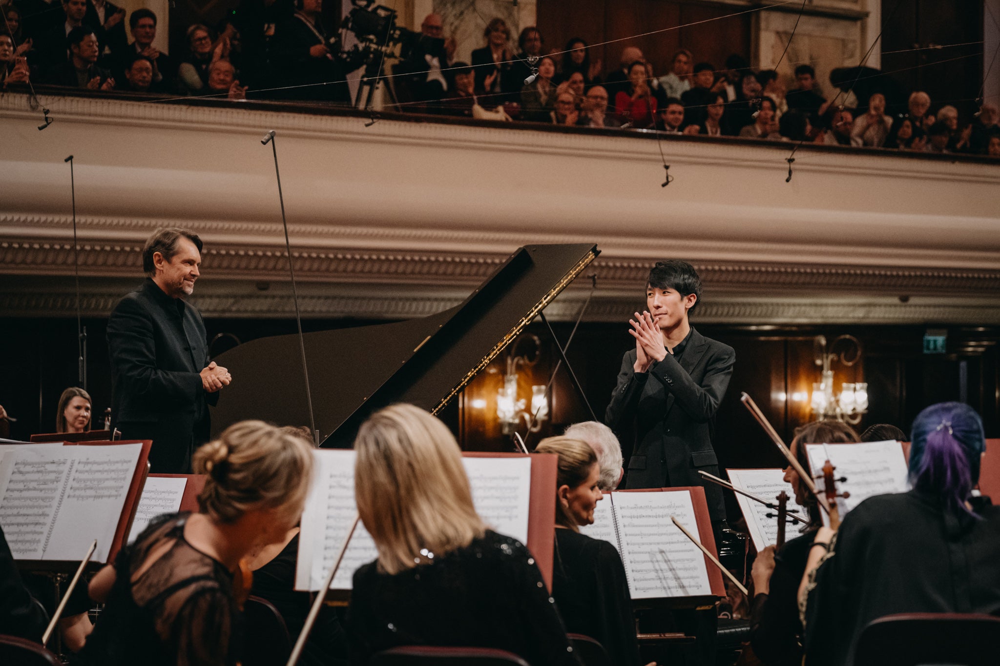 Eric Lu performs with the Warsaw Philharmonic Orchestra during the final stage of the 19th International Fryderyk Chopin Piano Competition