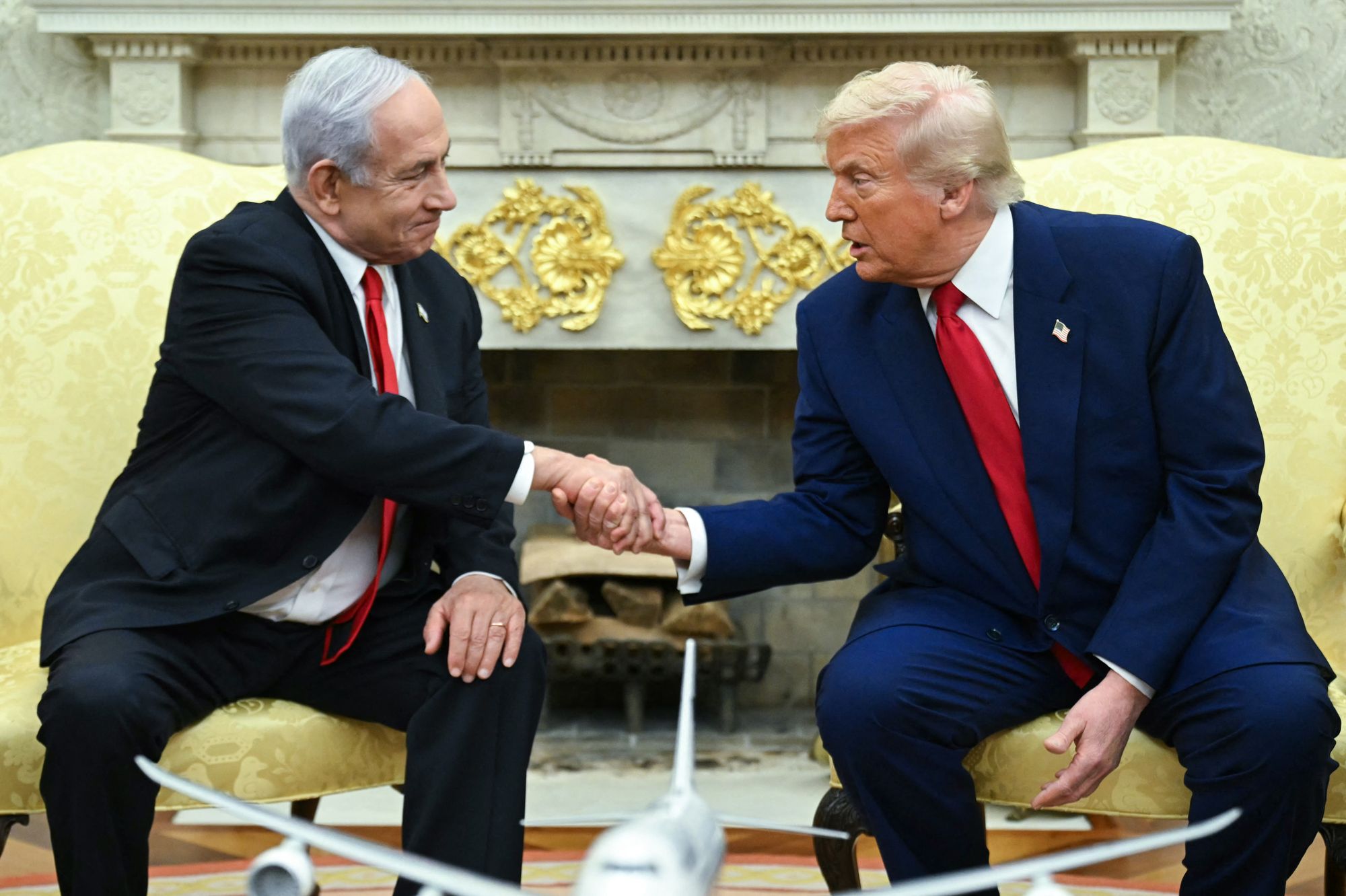 US President Donald Trump shakes hands with Israeli Prime Minister Benjamin Netanyahu during a meeting in the Oval Office of the White House in Washington, DC, on April 7, 2025