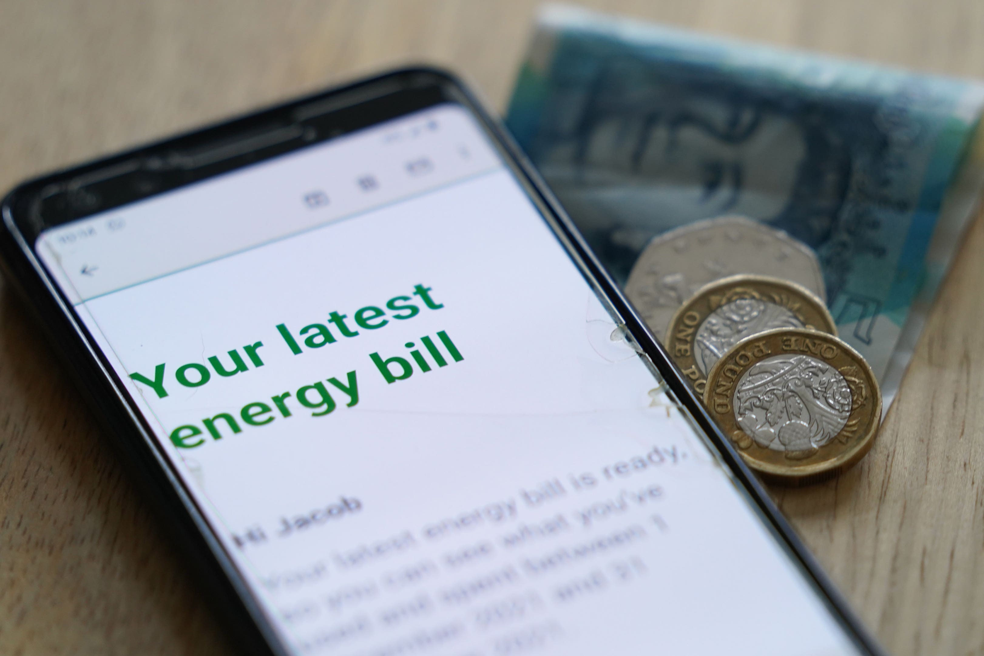 Up to £500 million of energy bill debt is to be paid off through bill increases spread across millions of UK households (Jacob King/PA)