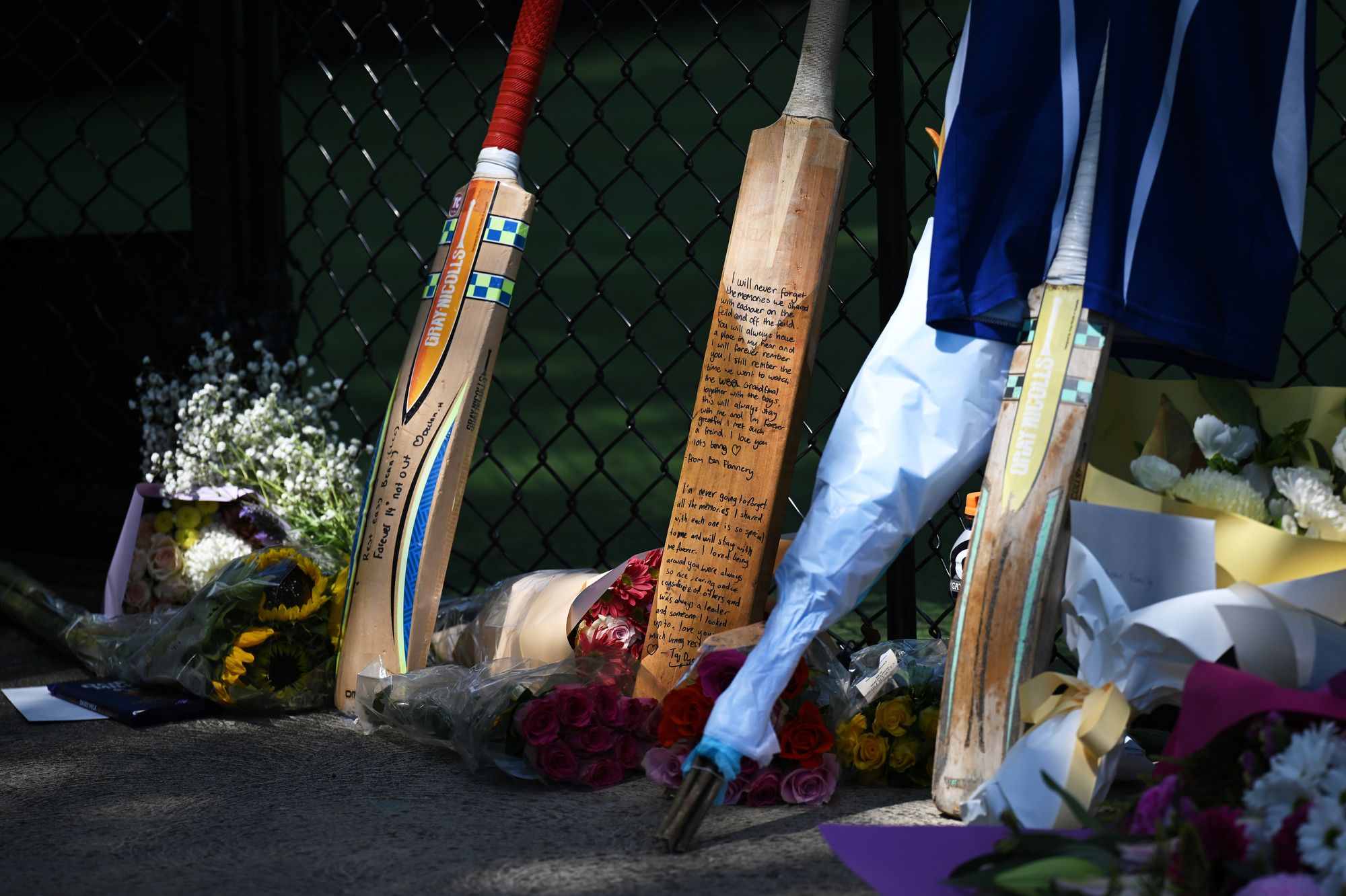 Tributes of cricket bats, flowers and notes on Thursday 30 October for the young player