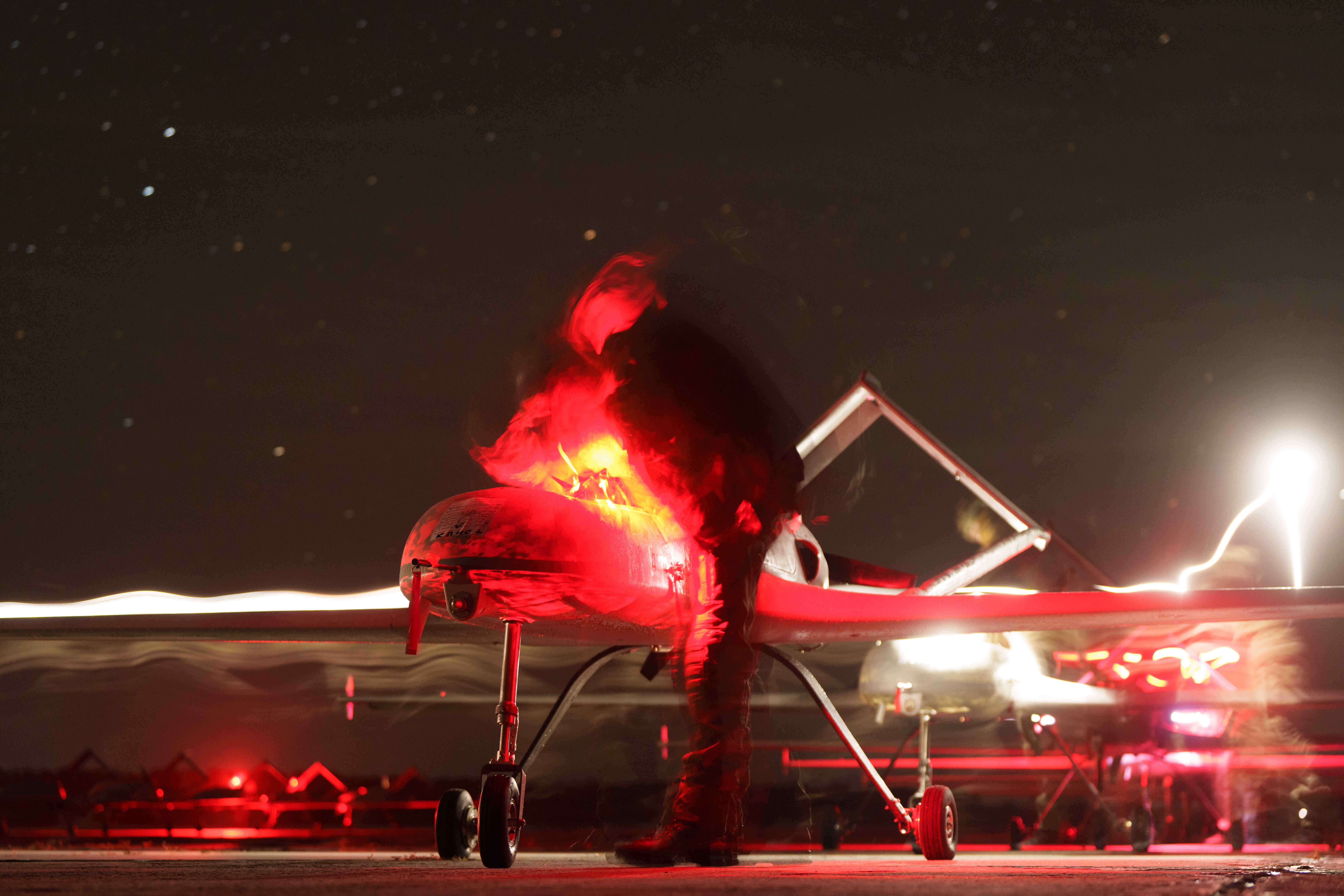 Ukrainian servicemen of the 14th Separate Unmanned Aerial Systems Regiment prepare long-range drones An-196 Liutyi before takeoff in an undisclosed location