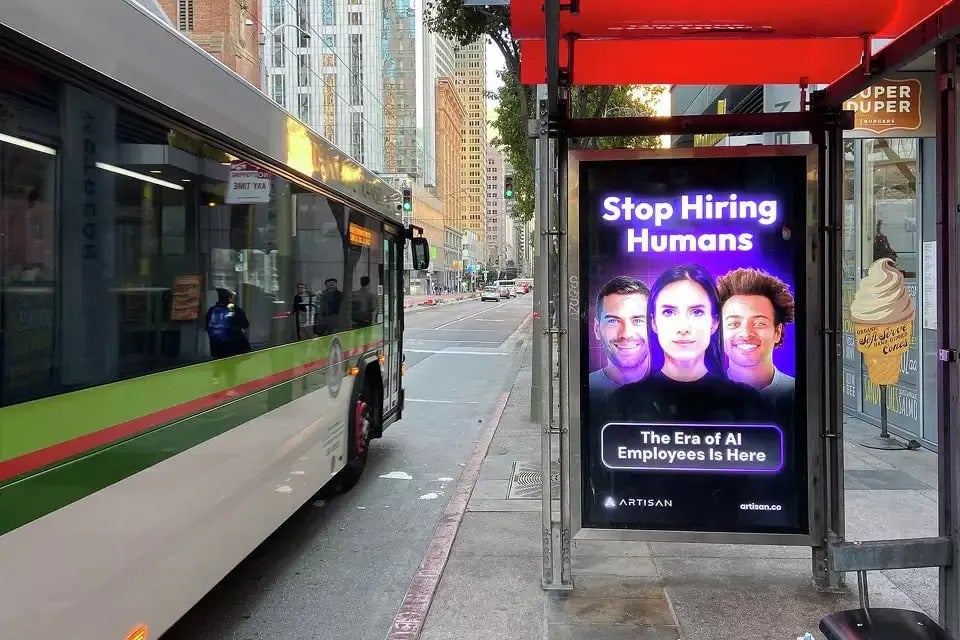 <p>Artisan, an AI agency in San Francisco, ran a poster billboard campaign exhorting firms to ‘Stop Hiring Humans’</p>