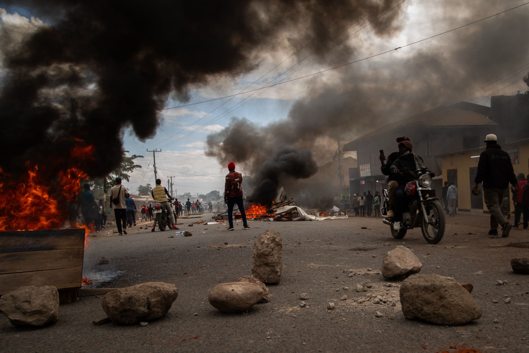 People protest in the streets of Arusha, Tanzania, on election day.