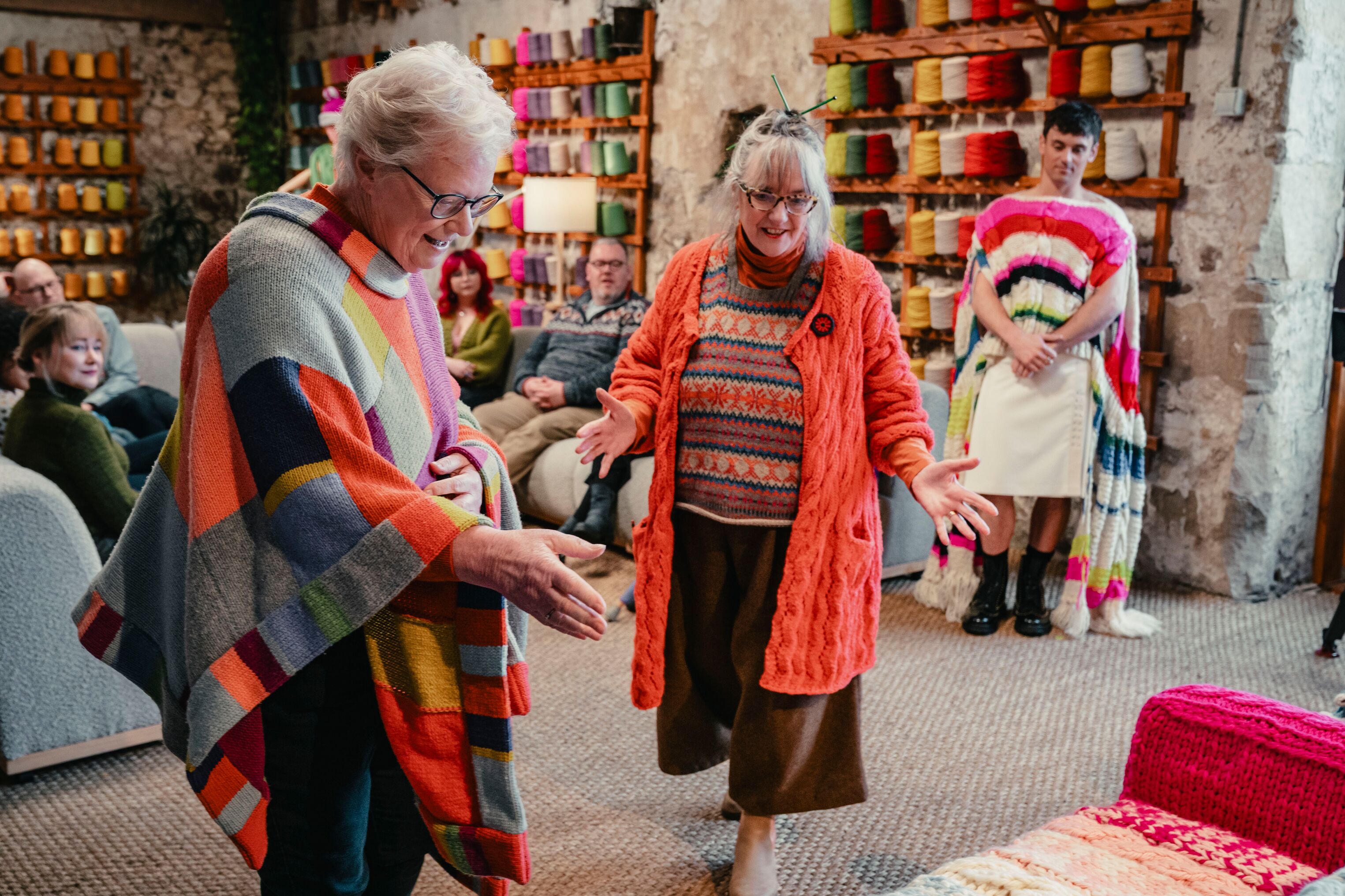 Judges Di Gilpin and Sheila Greenwell judging a group knit
