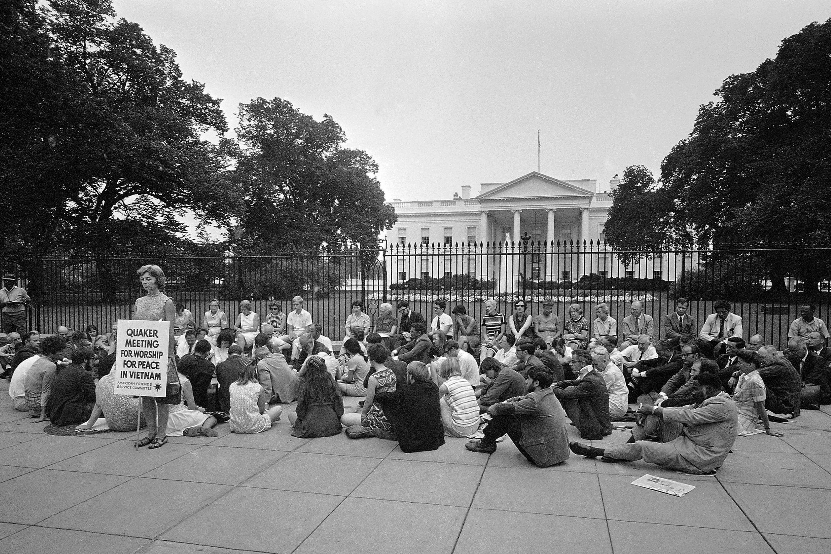A delegation of Quakers sits in front of the White House in Washington, July 7, 1969, protesting the war in Vietnam. (AP Photo/Charles Harrity, File)