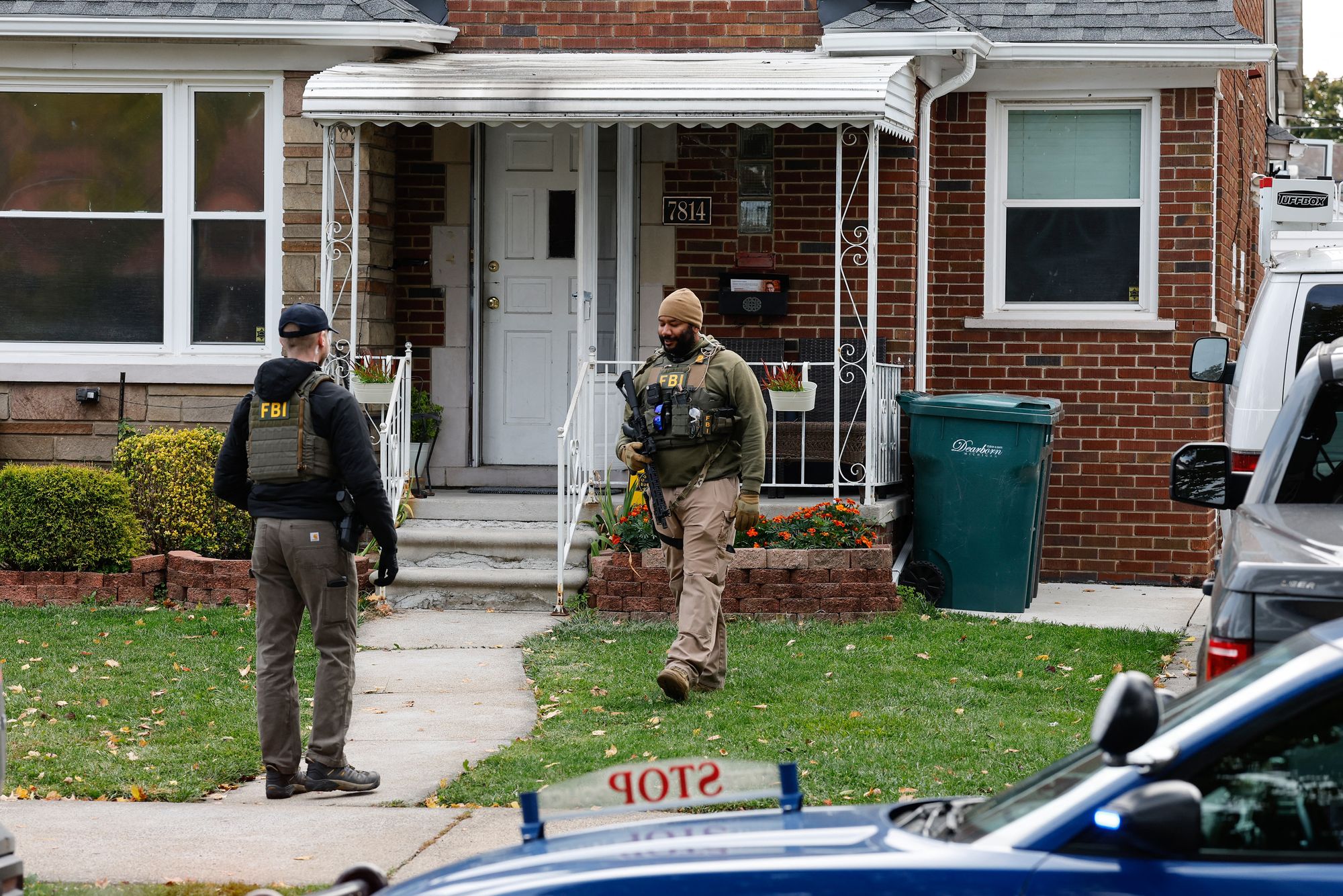 Members of the FBI Joint Terrorism Task Force search a home in Dearborn, Michigan, on October 31, 2025