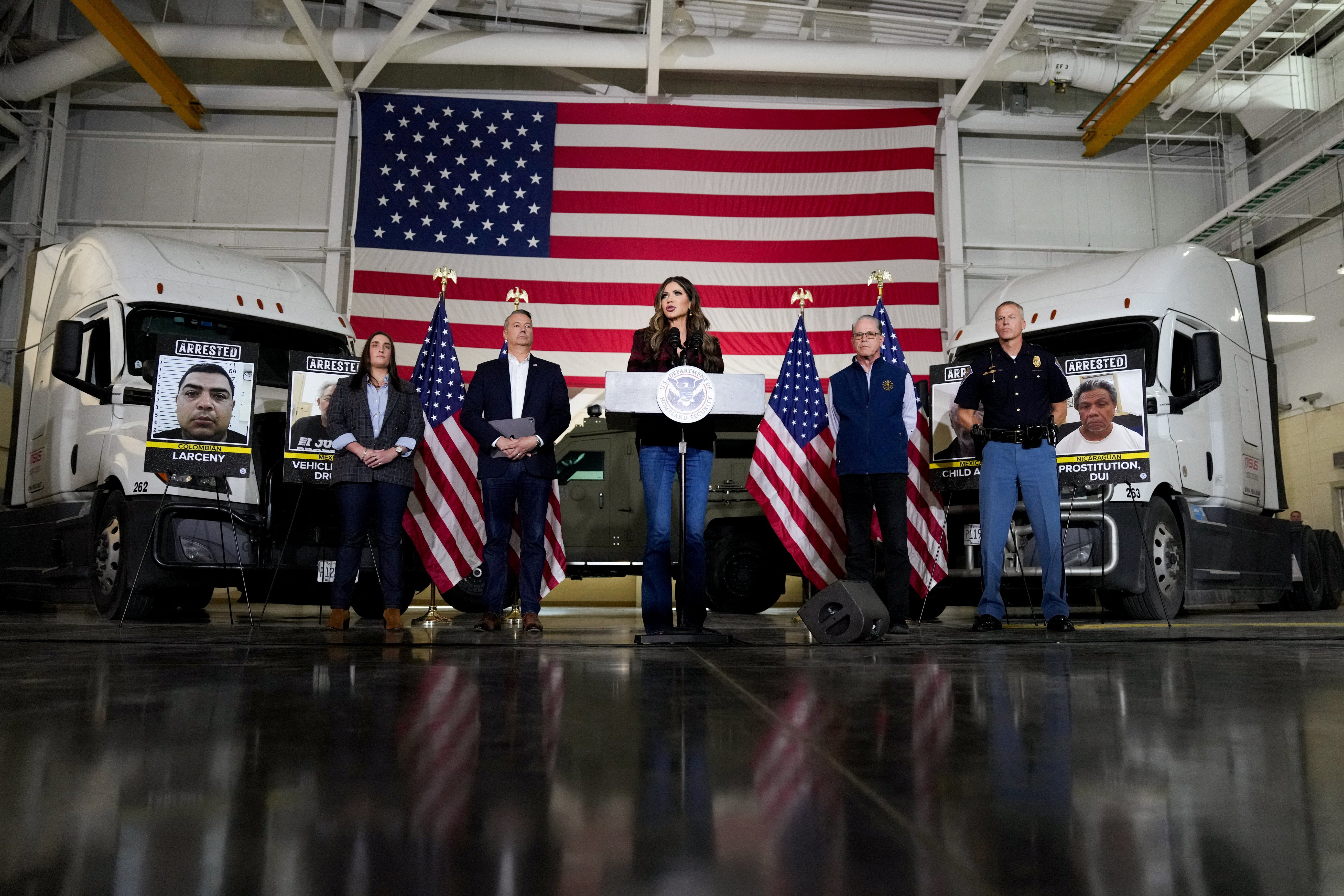 Noem, standing in front of two large trucks, announced 146 truck drivers were arrested in Indiana, claiming that the drivers had ‘overwhelmingly’ received licenses from California, New York and Illinois