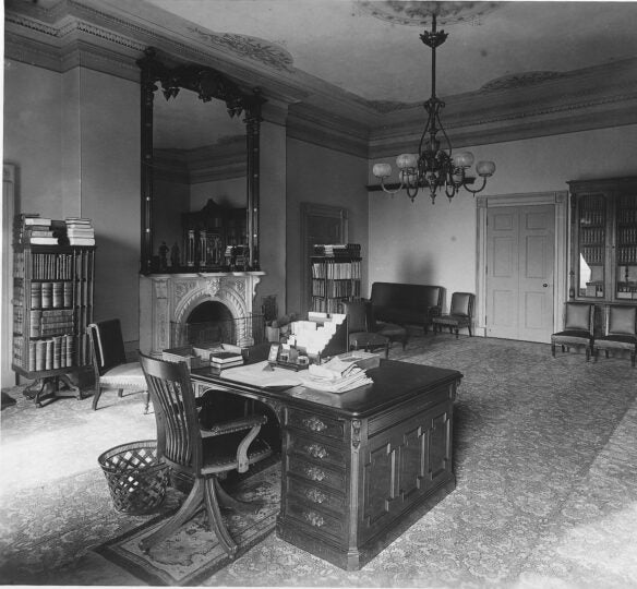 Historical accounts of the Lincoln Bedroom describe it featuring carpet, wallpaper, and heavy wooden furniture, rather than marble