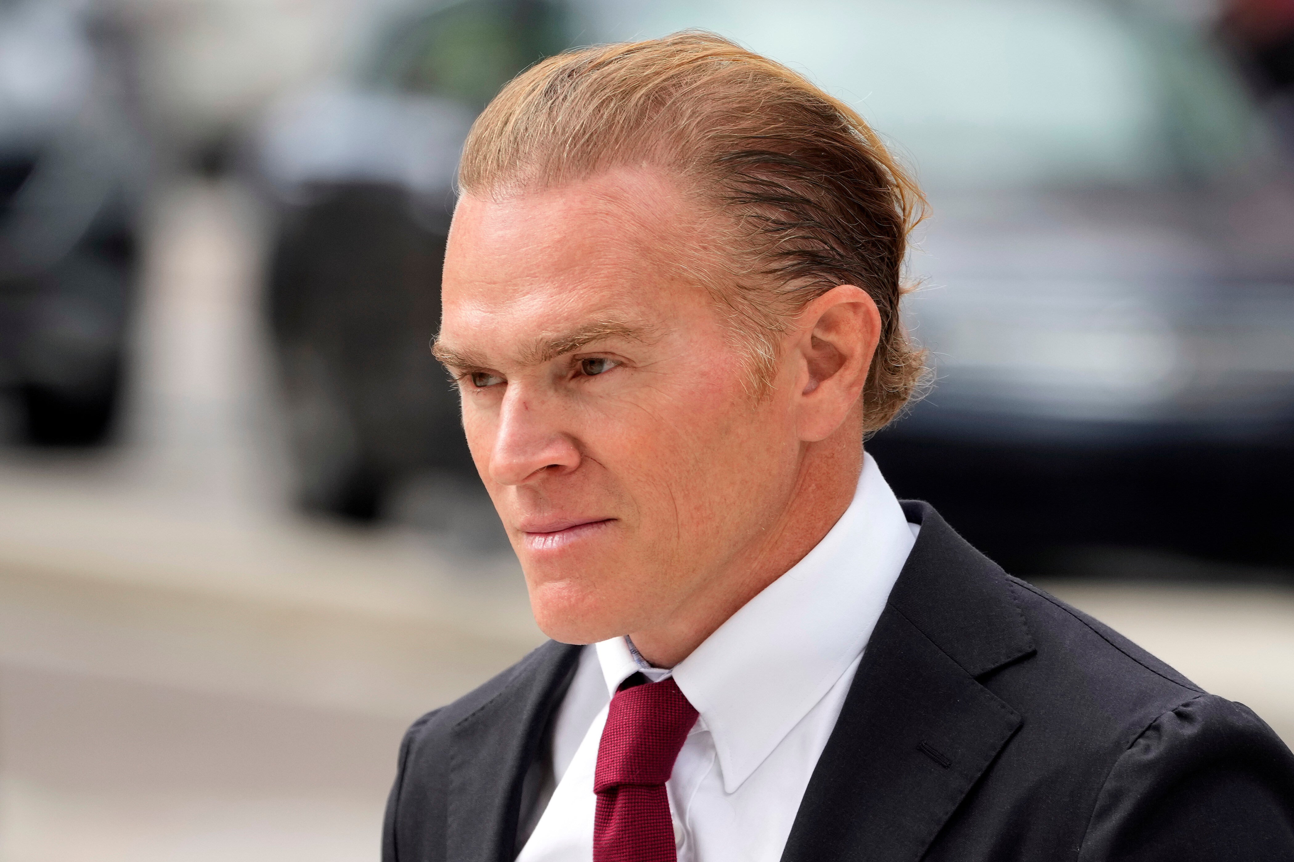 Former Green Beret Jordan Goudreau walks to the United States Courthouse for a bond hearing in Tampa, Fla., Wednesday, Oct. 29, 2025. (AP Photo/Chris O'Meara)