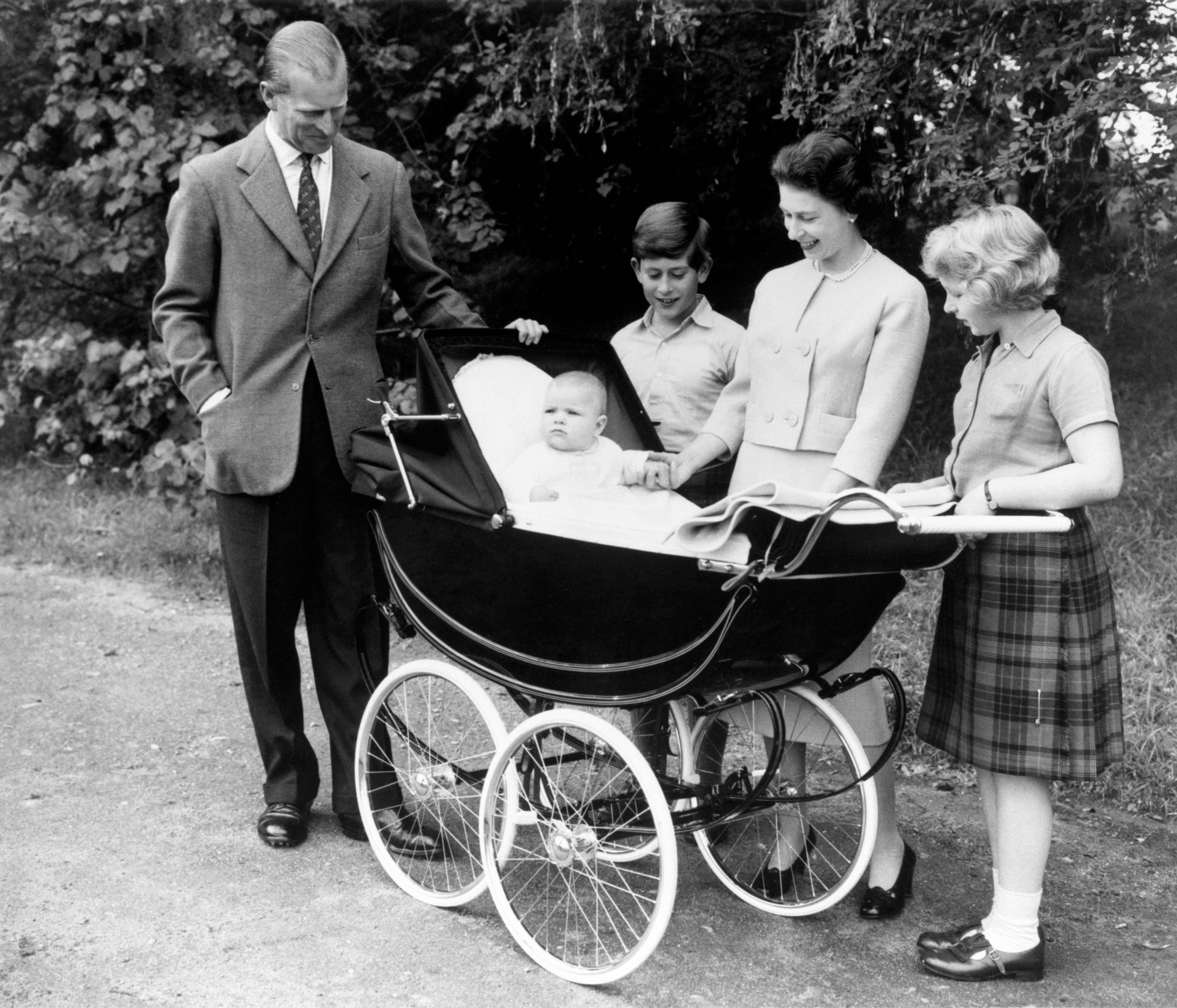 Pampered prince: Andrew as a baby, pictured in the comfort of his pram on the Balmoral Estate