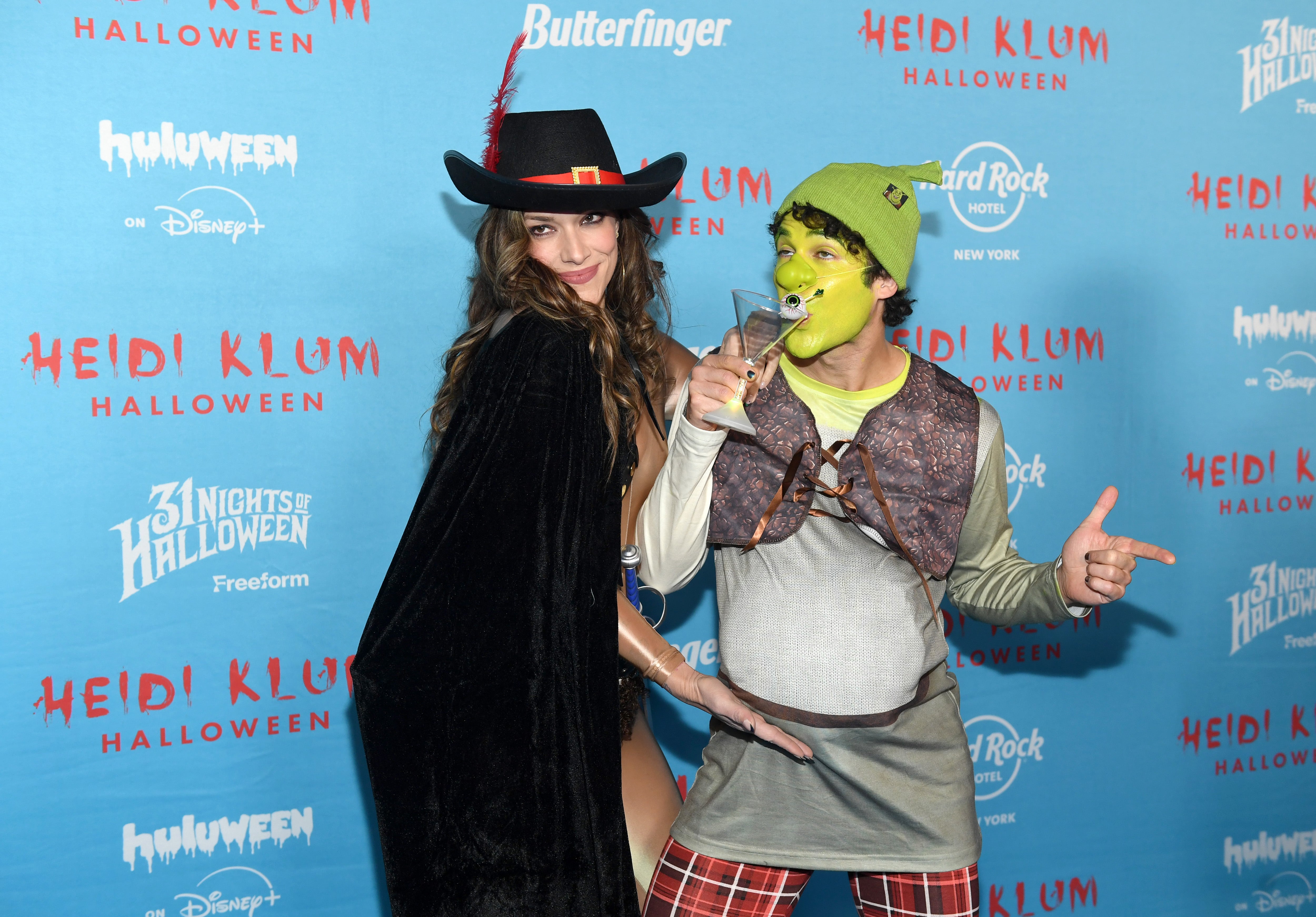 Mia Swier and Darren Criss attend Heidi Klum's 24th Annual Halloween Party