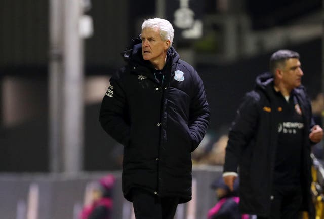 <p>Mark Hughes managed Carlisle to an FA Cup first-round upset against Reading</p>