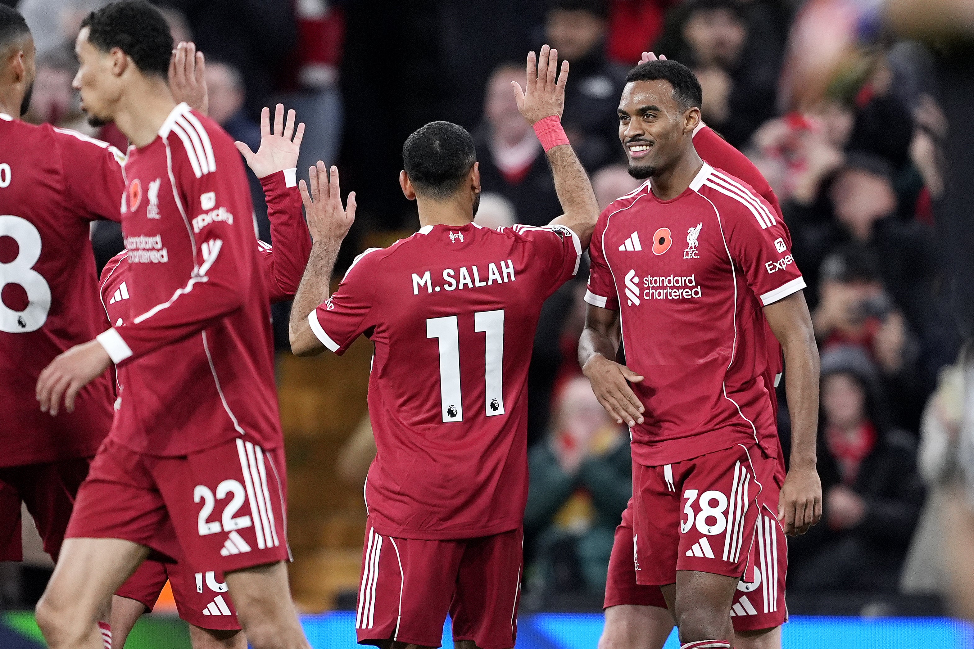 Salah, second right, and Gravenberch, right, help Liverpool return to winning ways (Peter Byrne/PA)