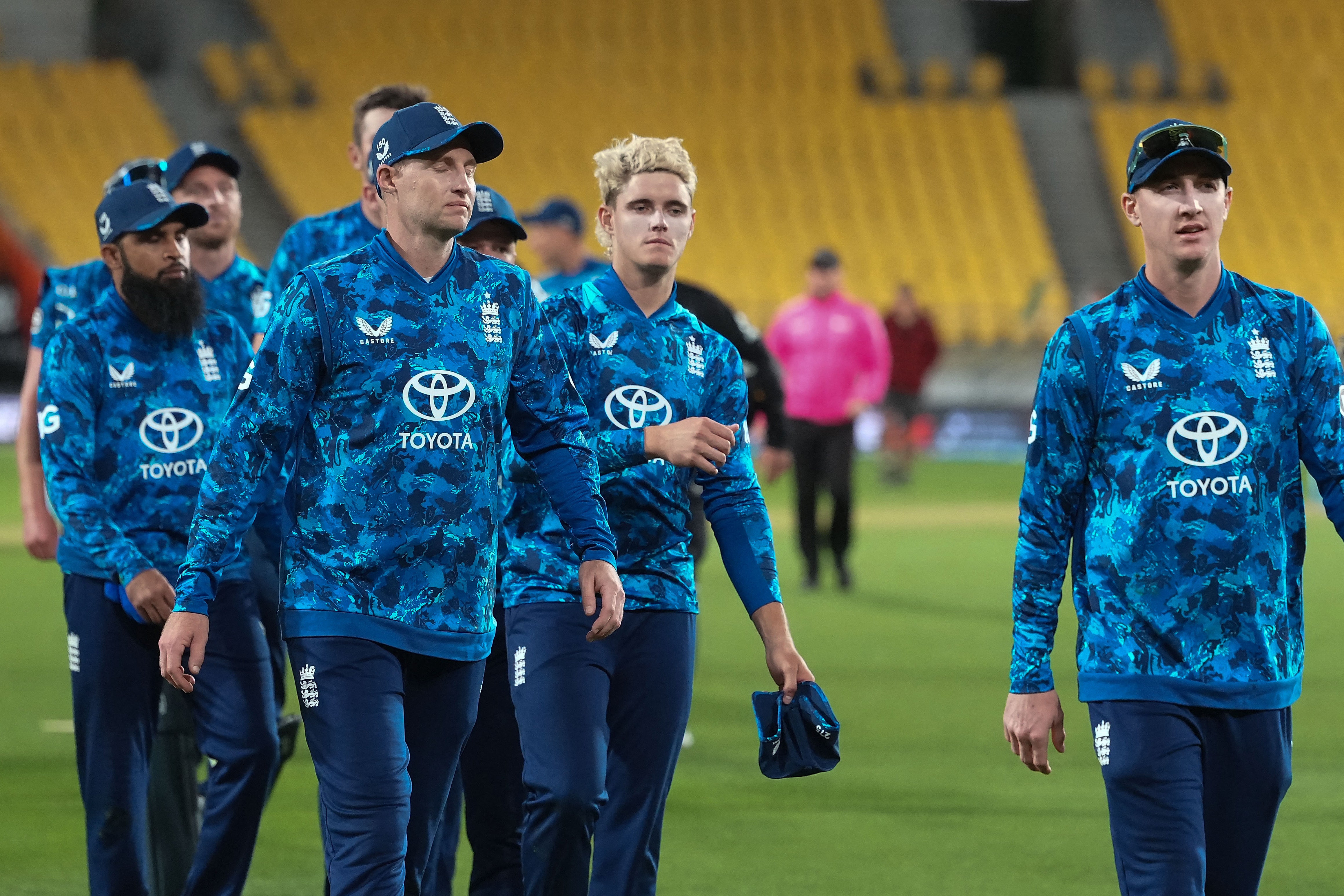 England players walk from the field after their loss in the third one-day international