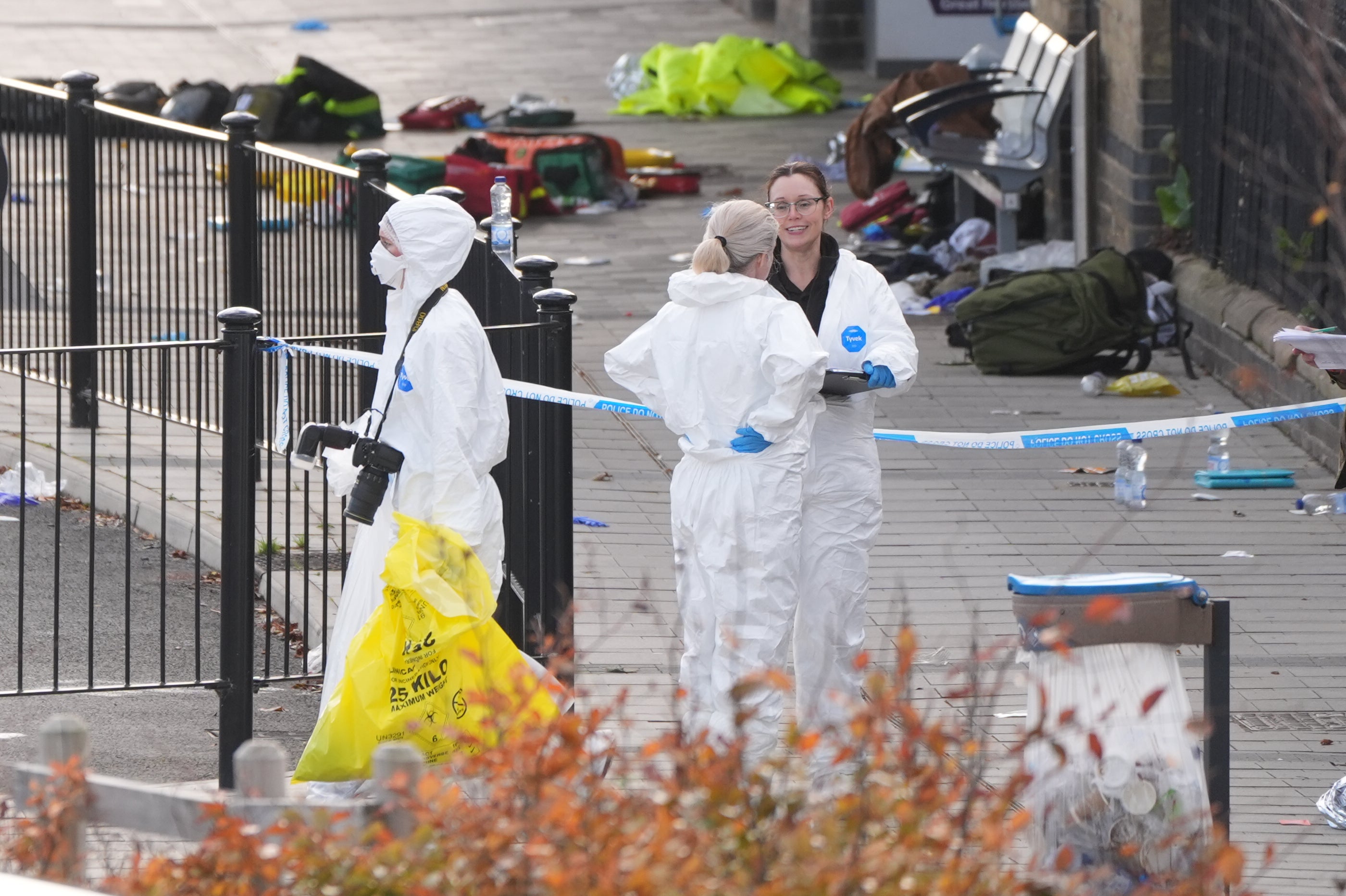 Forensics remain at the scene on Sunday