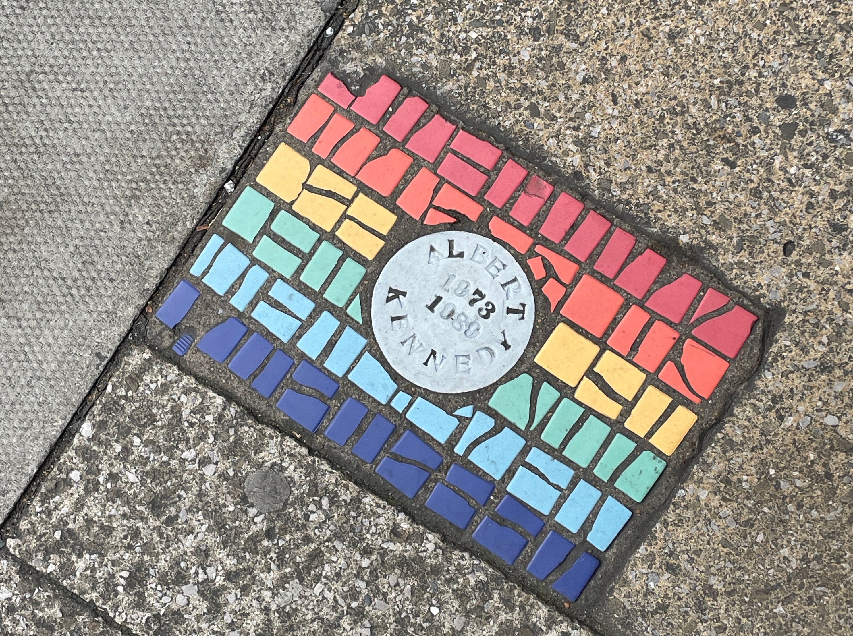 Heritage Trail mosaic plaque remembering Albert Kennedy