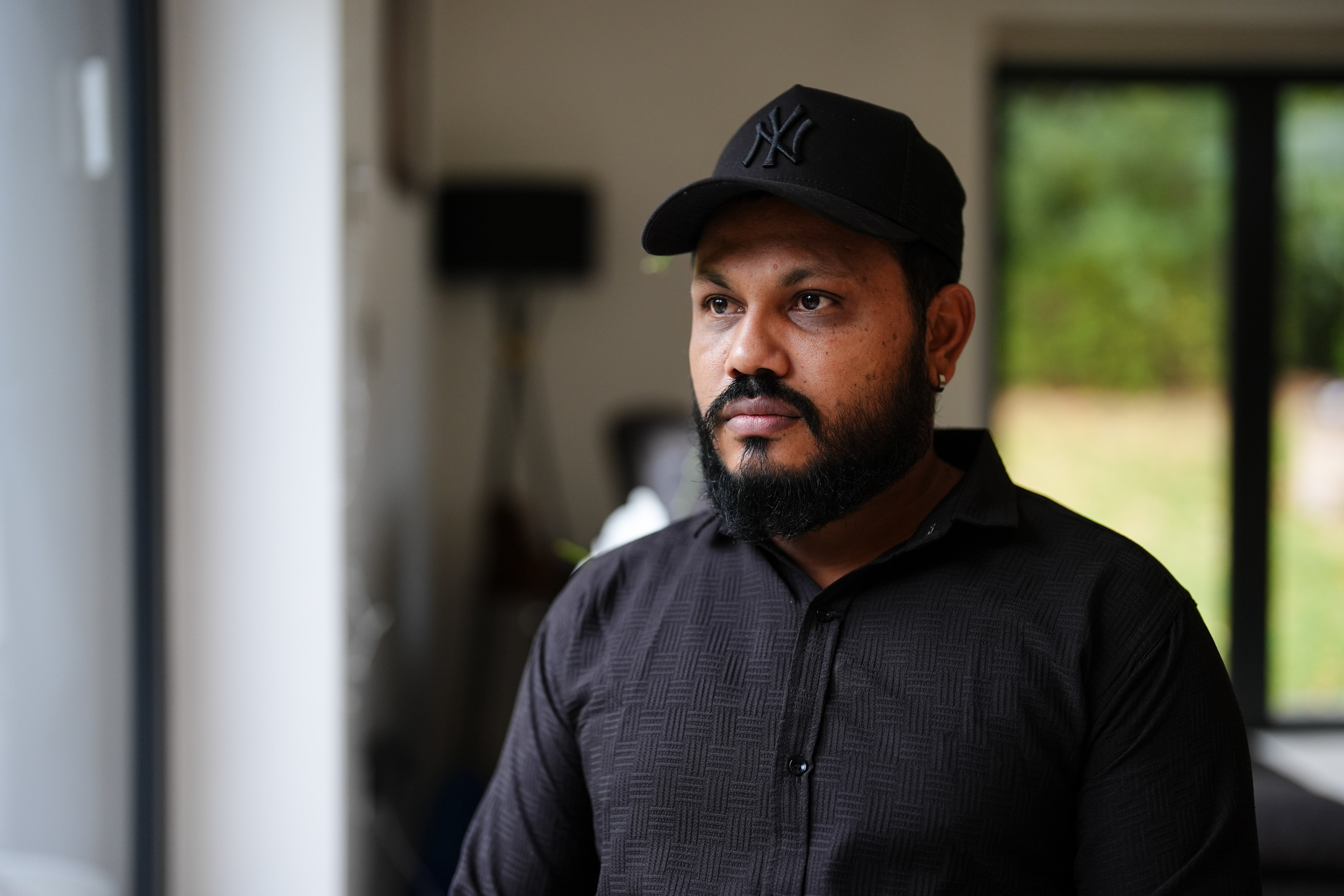 Ramesh wore a New York Yankees cap to the interview in memory of his brother