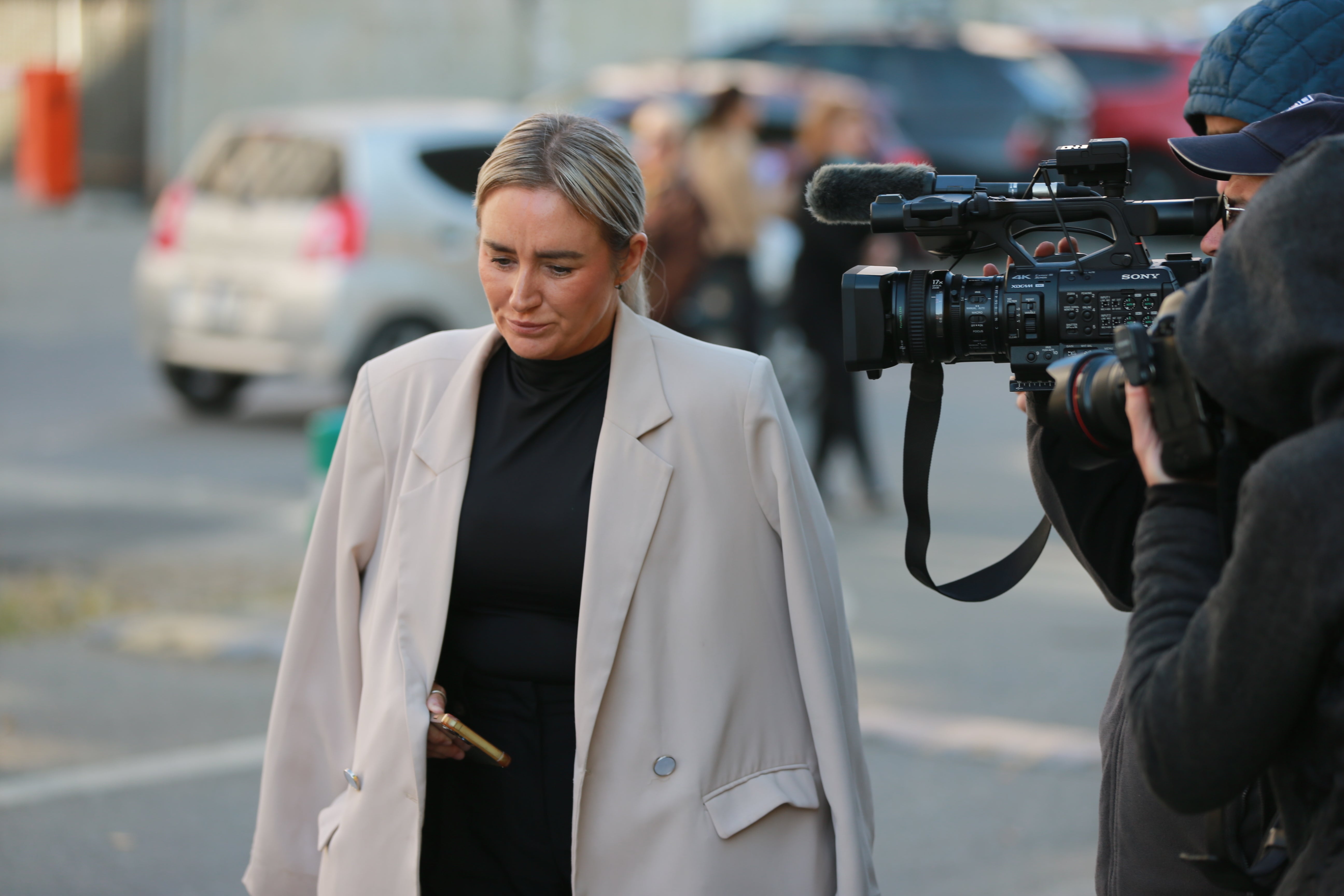 Lyanne Kennedy arrives at a court hearing in Tbilisi