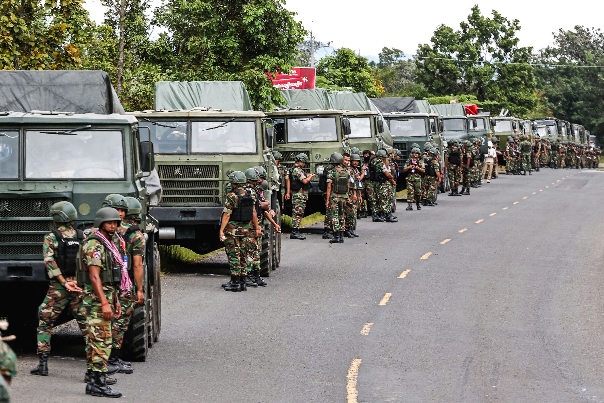 Cambodian soldiers stand next to a convoy of rocket launchers in Preah Vihear province