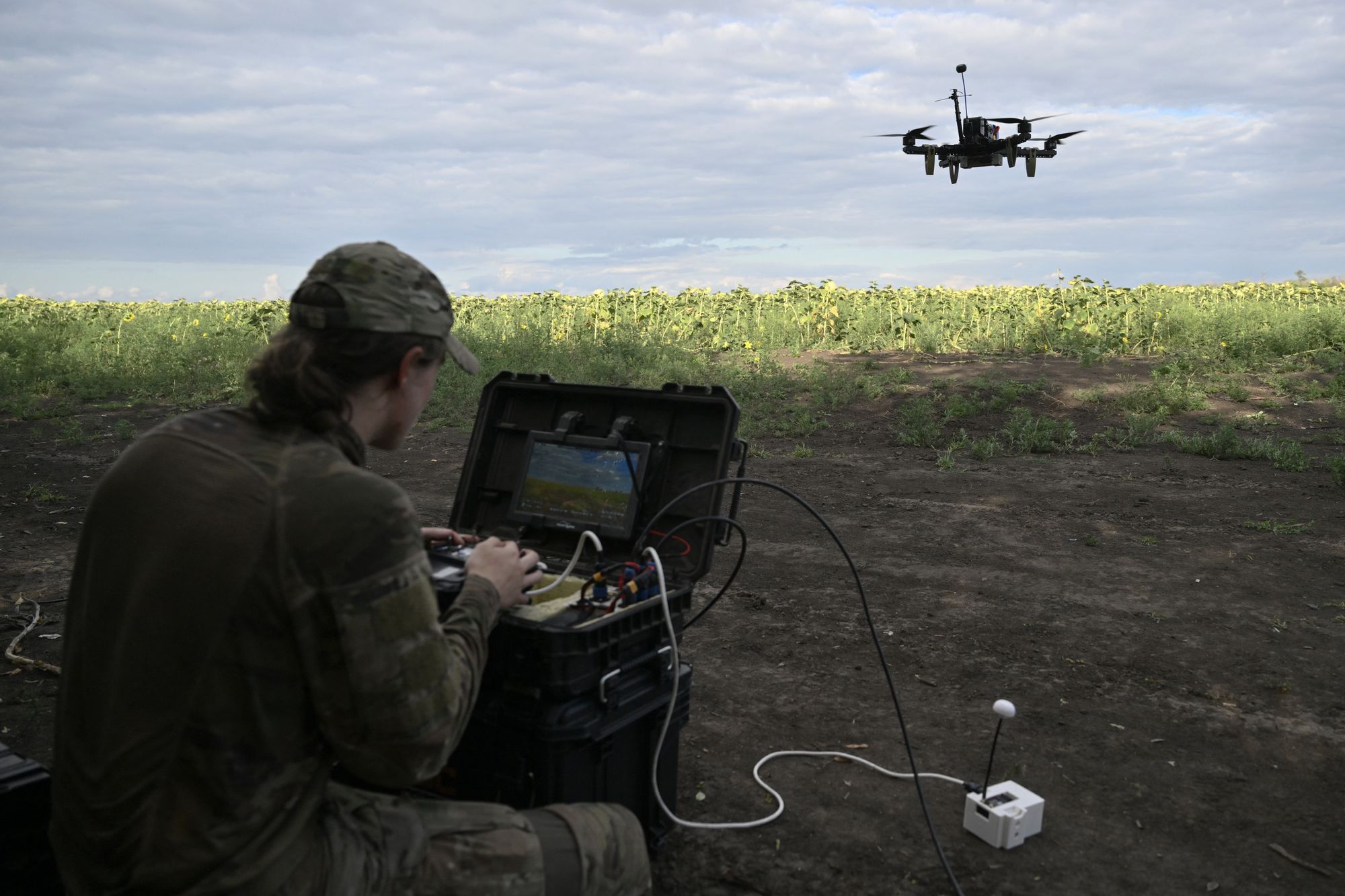 A Ukraine drone pilot controls an FPV drone during a training flight