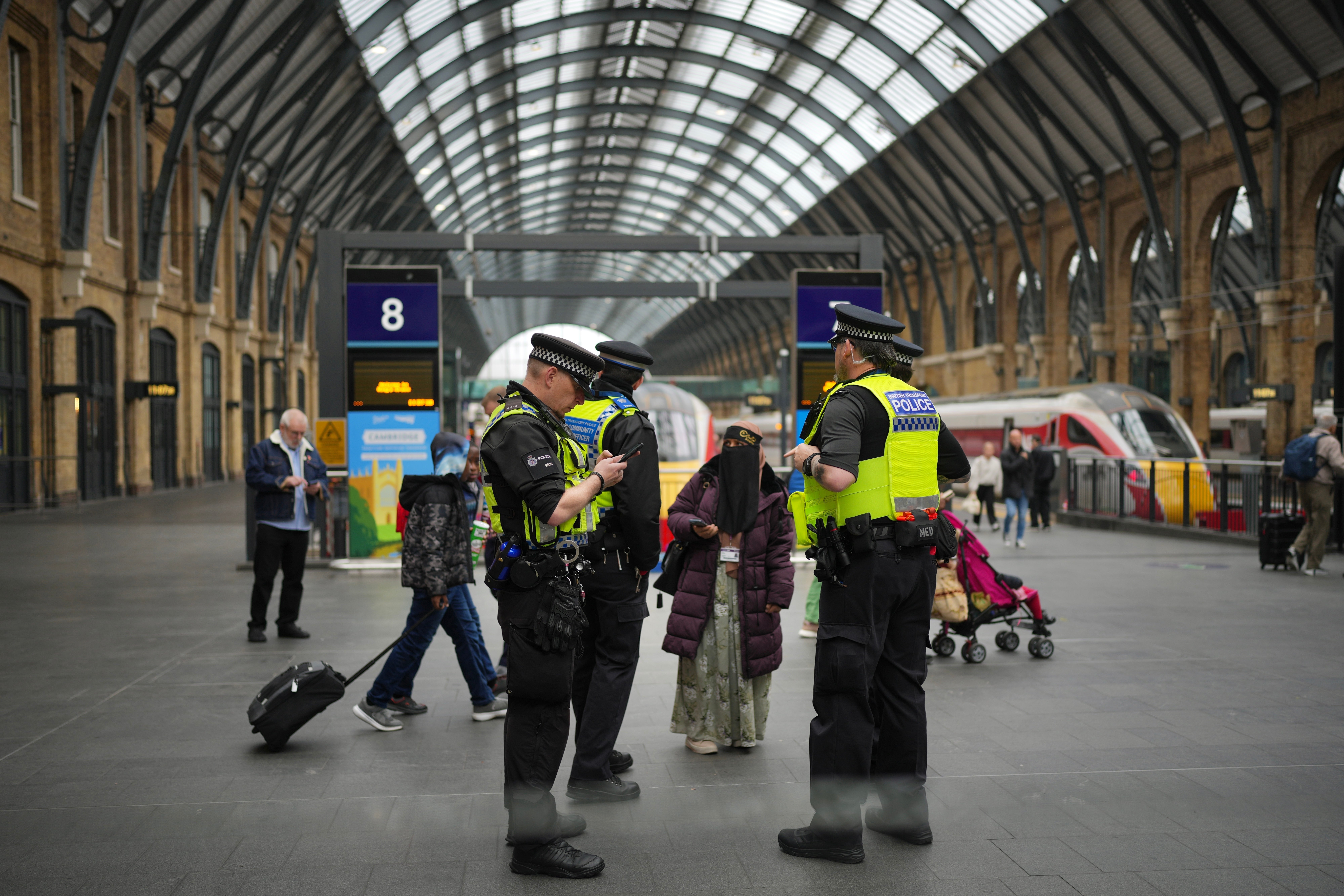Armed police were seen patrolling busy London stations including King’s Cross on Monday morning